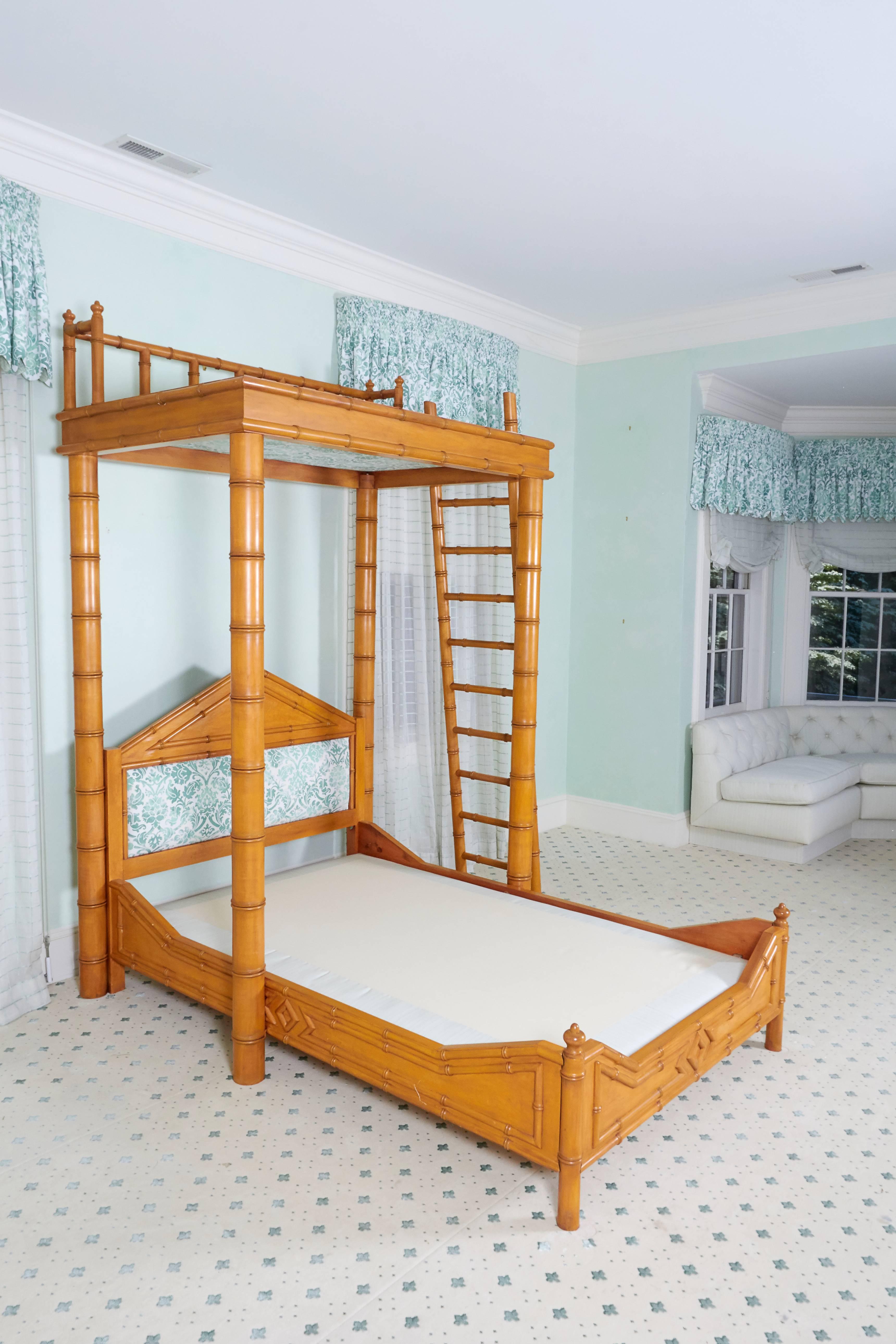 Fits a full size mattress. With triangular shaped headboard and four vertical supports leading to a platform accessible by a detached ladder.