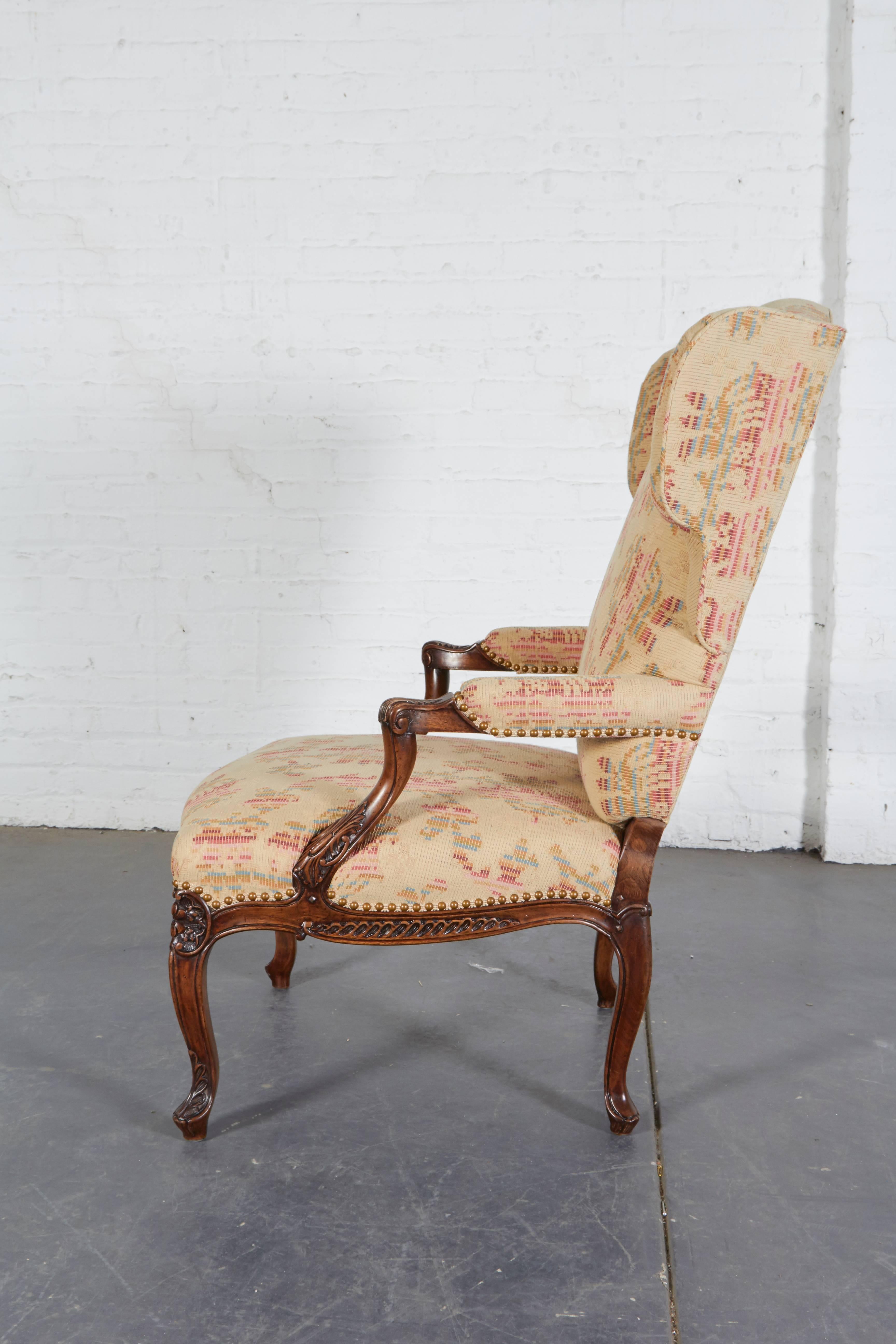 Upholstery Pair of Louis XV Style Walnut Wing Chairs
