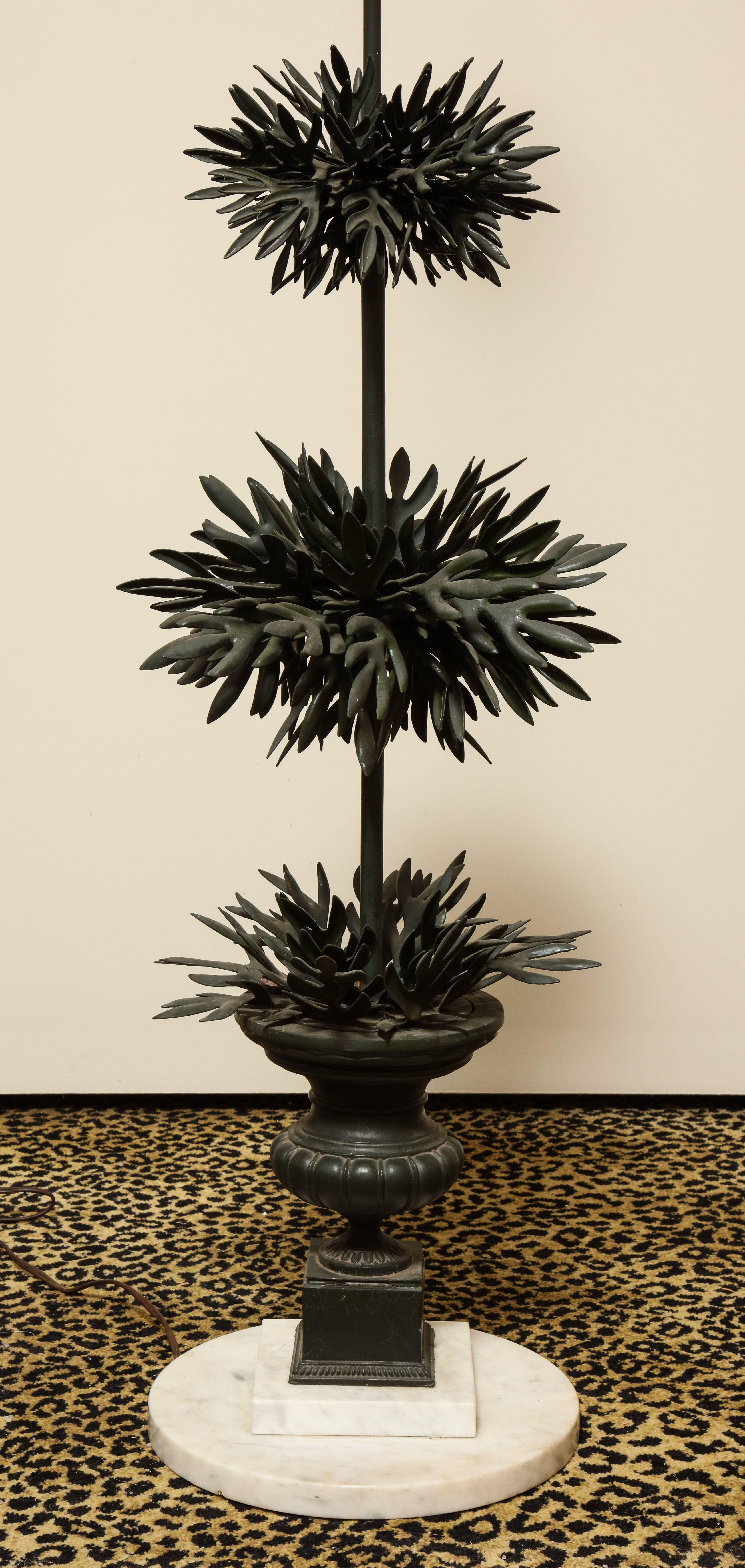 Fanciful lamp with three ball spiky topiary issuing from a gadrooned urn mounted on a marble plinth base. Rewired.