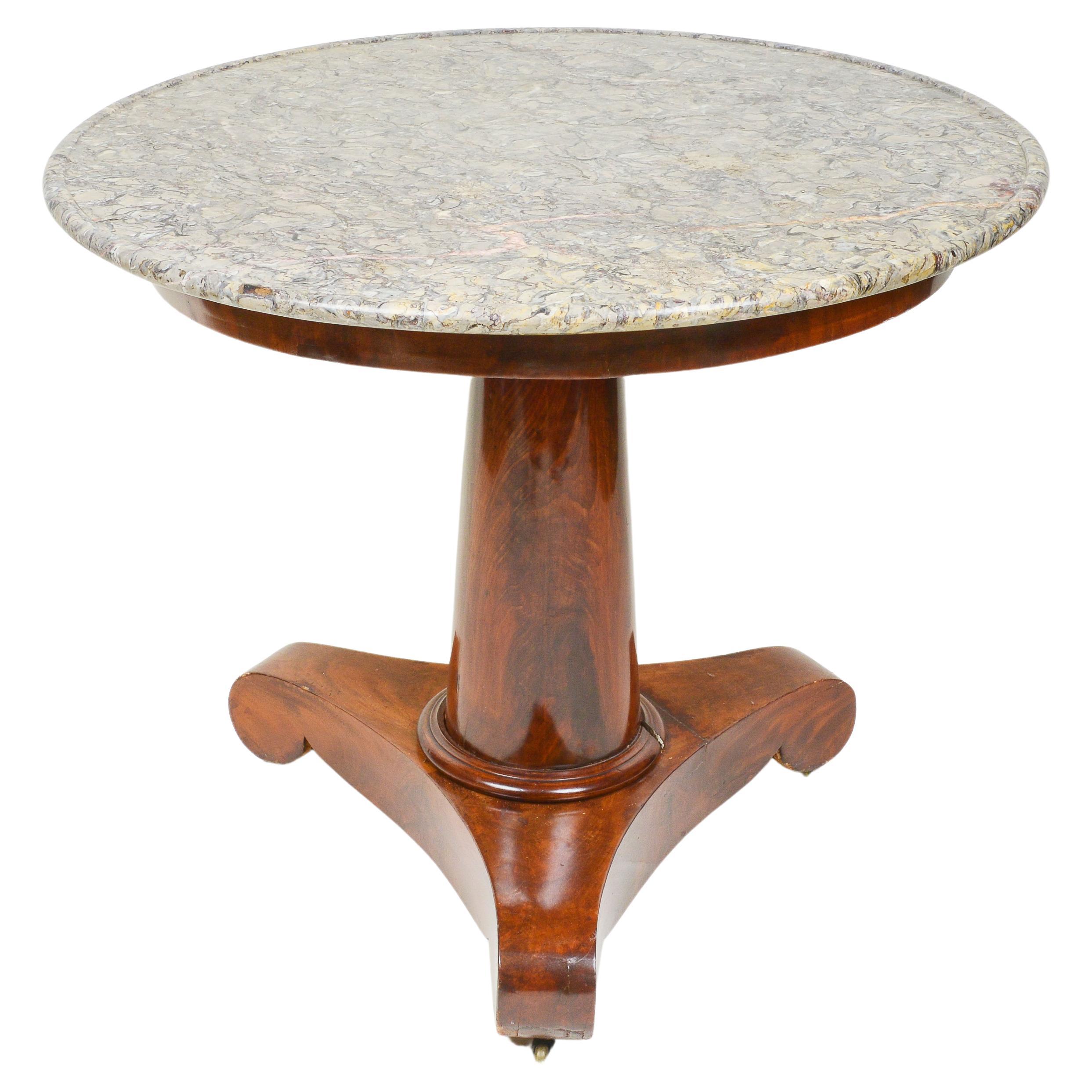 A French Empire Mahogany Gueridon with a Gray Marble Top For Sale