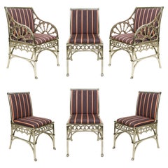 Ensemble de six chaises gothiques en nickel poli et tapissées