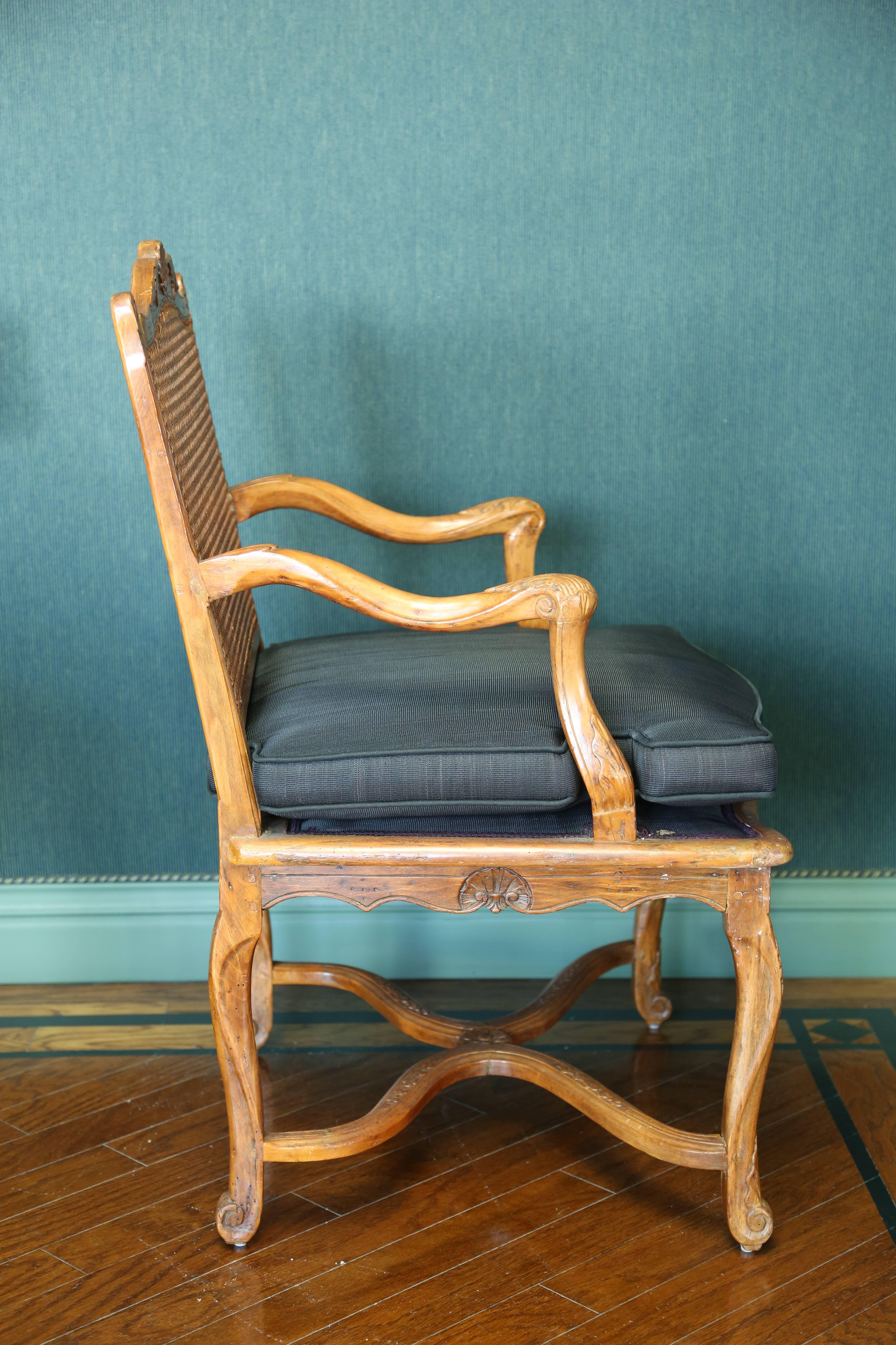 18th Century French Régence Carved and Caned Beechwood Fauteuil