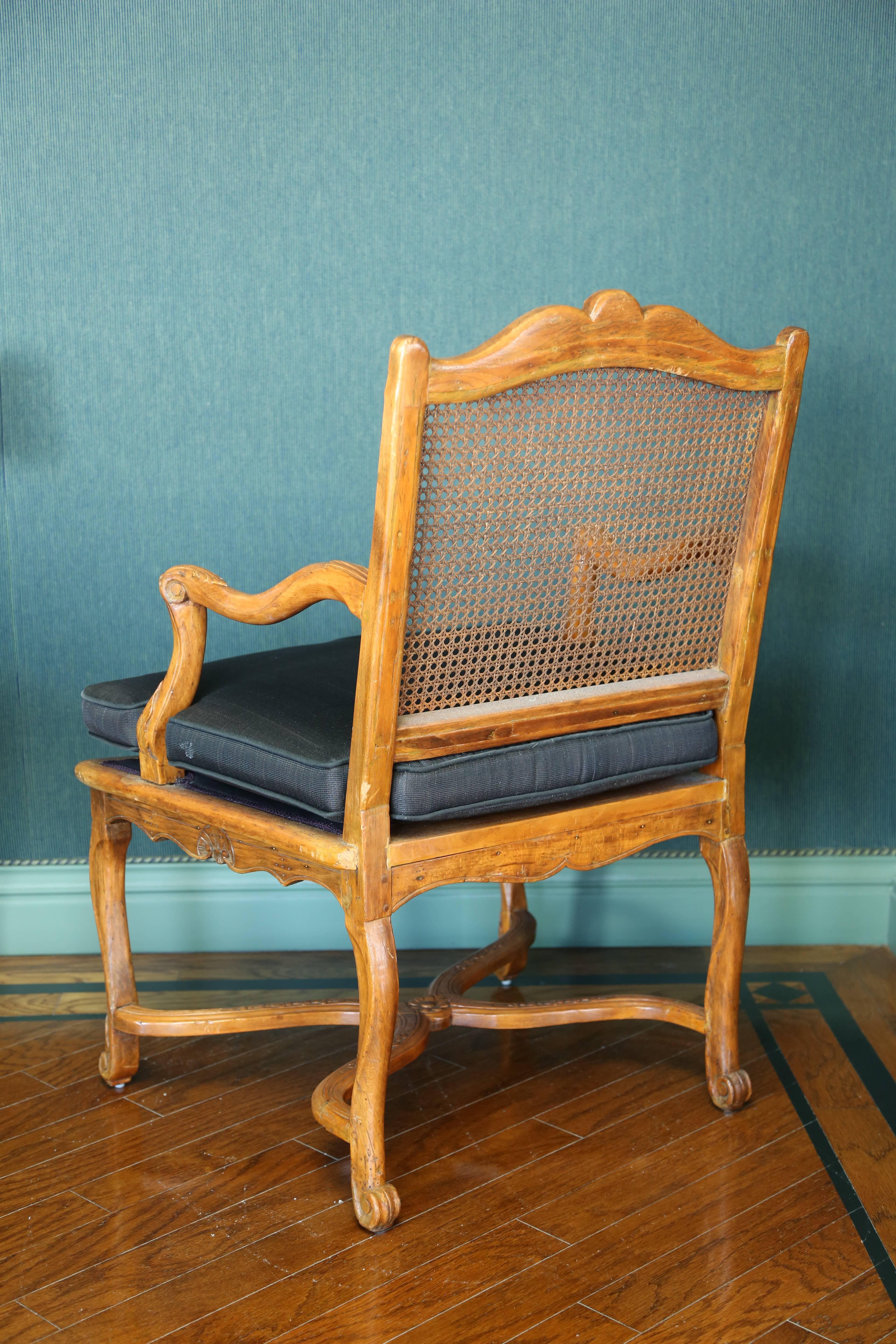 French Régence Carved and Caned Beechwood Fauteuil 1
