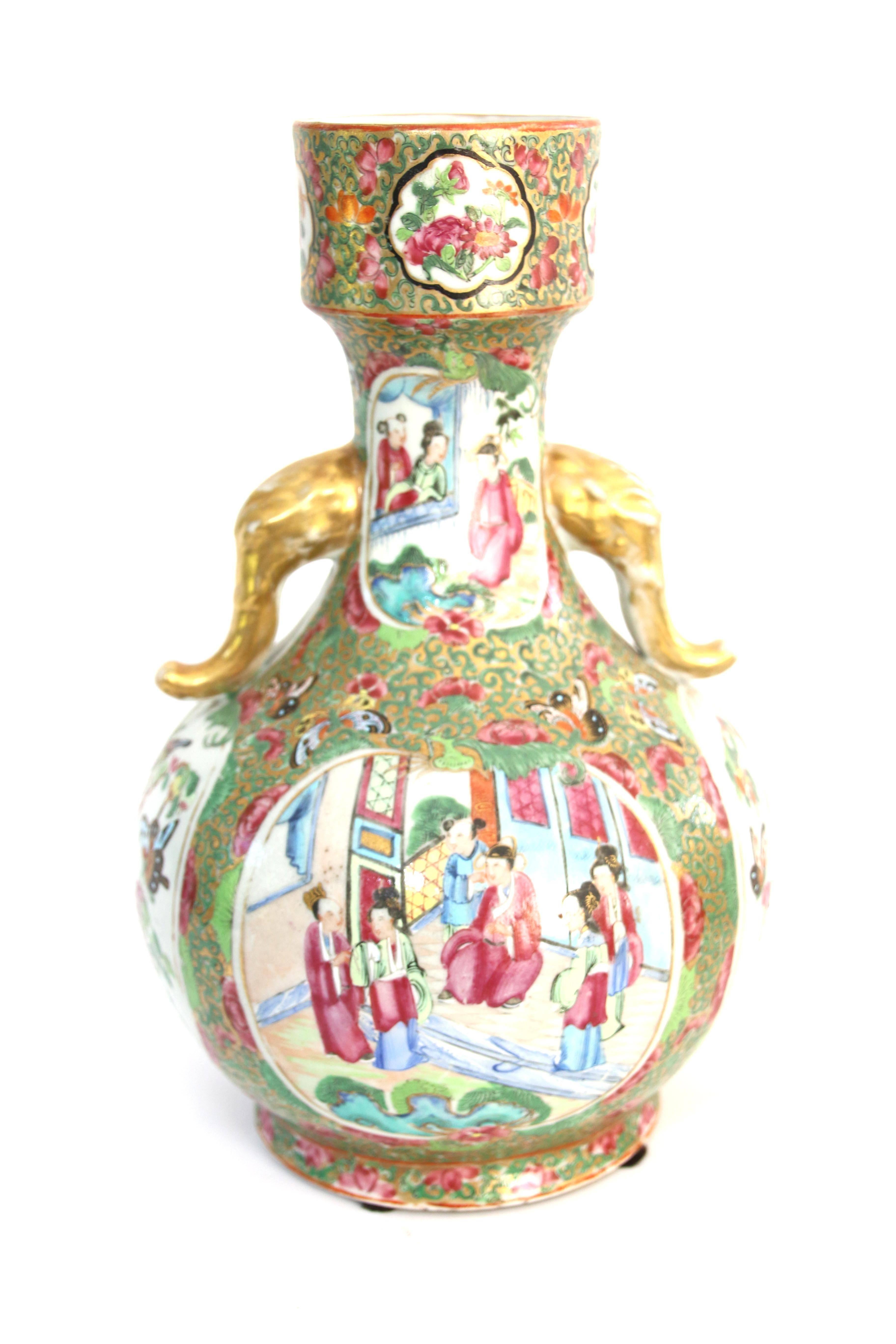 Porcelain Pair of 19th Century Chinese Export Rose Mandarin Bottle Form Vases For Sale