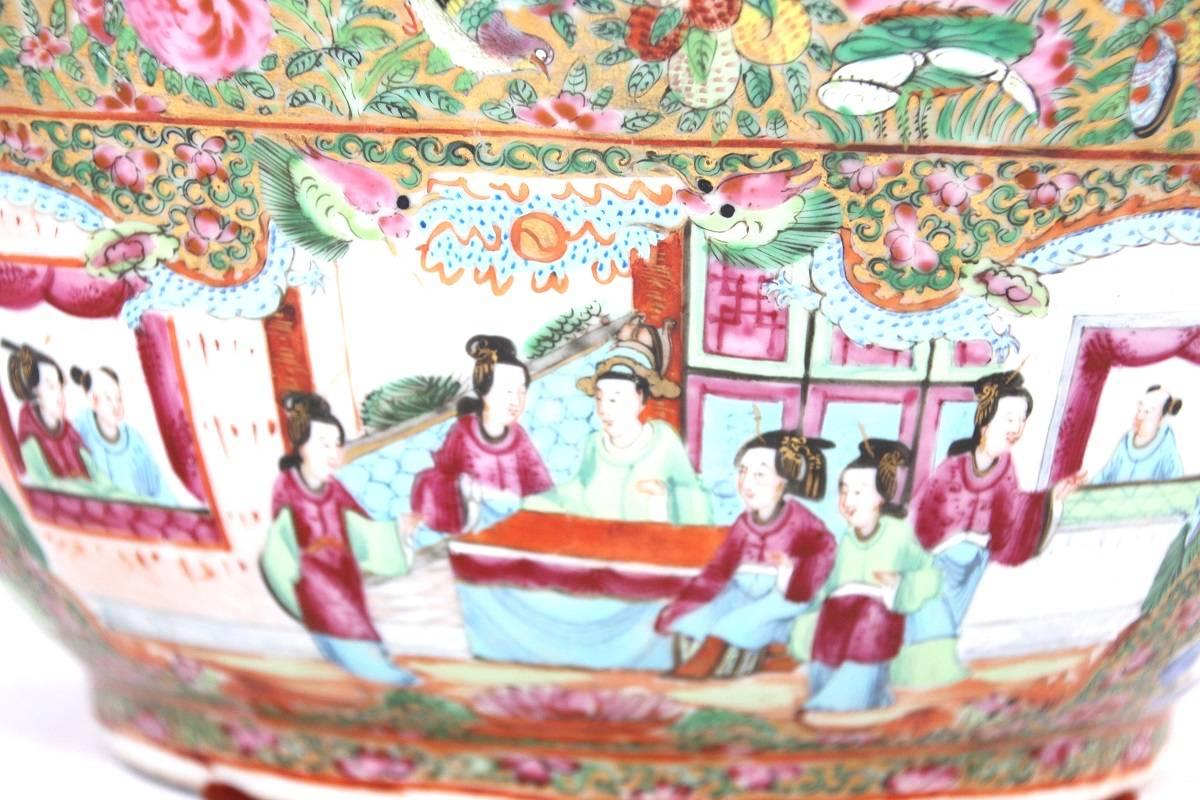 19th century Chinese Export porcelain rose medallion bowl with figural decoration consisting of court scenes and floral and bird decoration. 

No chips or cracks.

Measures: 13.5 inches diameter by 5.75 inches high.