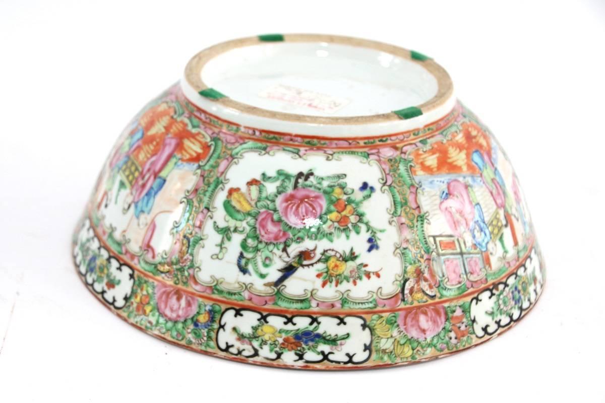 19th century Chinese export porcelain rose medallion bowl with figural decoration consisting of court scenes and floral and bird decoration. 

No chips or cracks.

Measures: 11.5 inches diameter by 4.625 inches high.