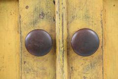 19th Century New England Chrome Yellow Cupboard with Panelled Doors