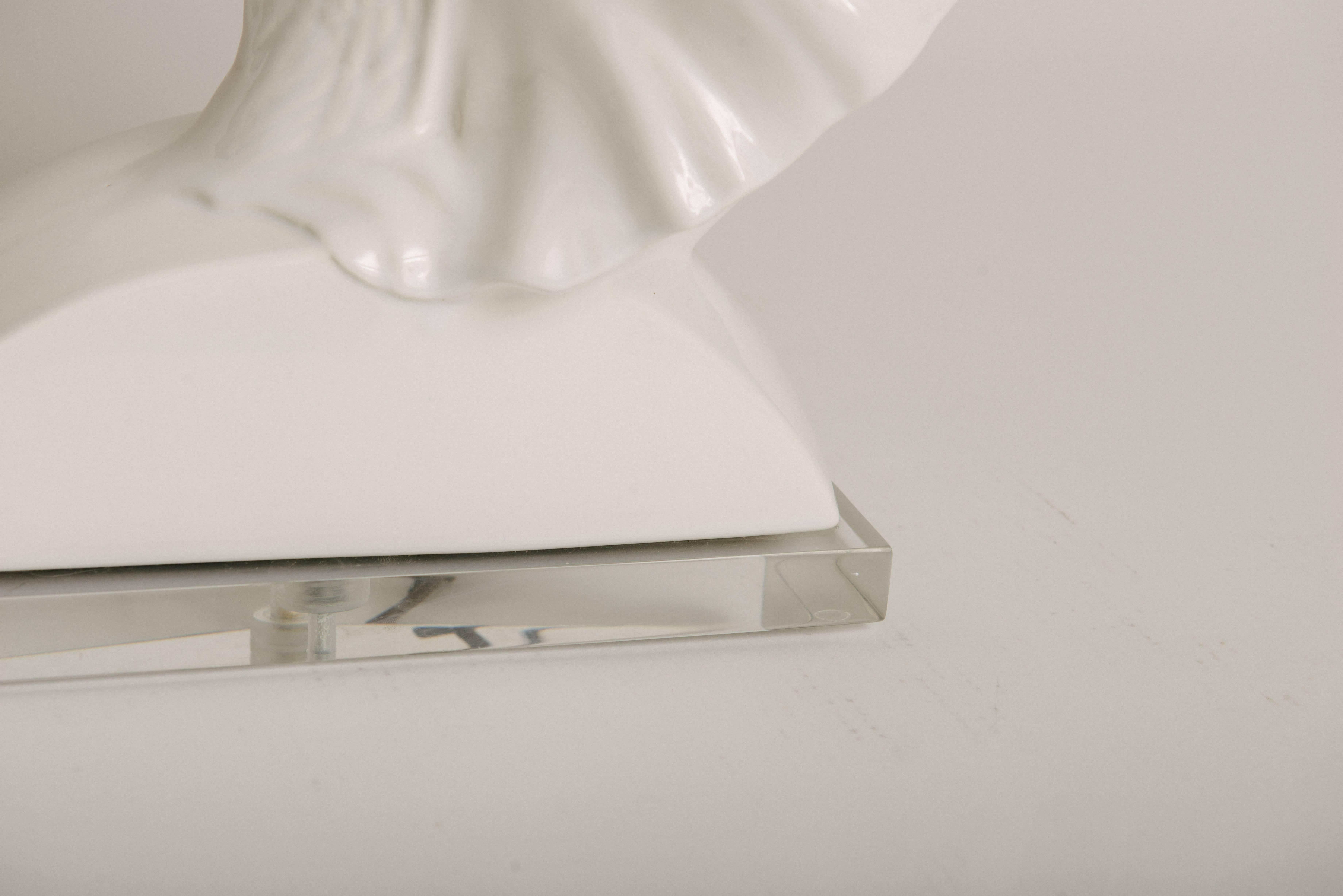 white ceramic elephant lamp