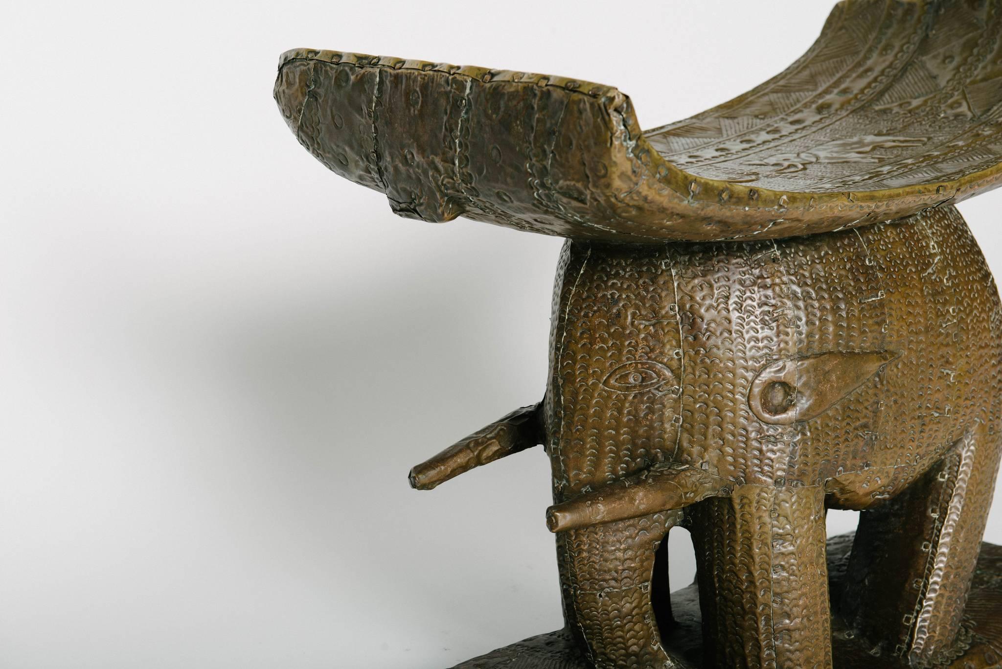 Early 20th century Ghana hammered bronze elephant seat.