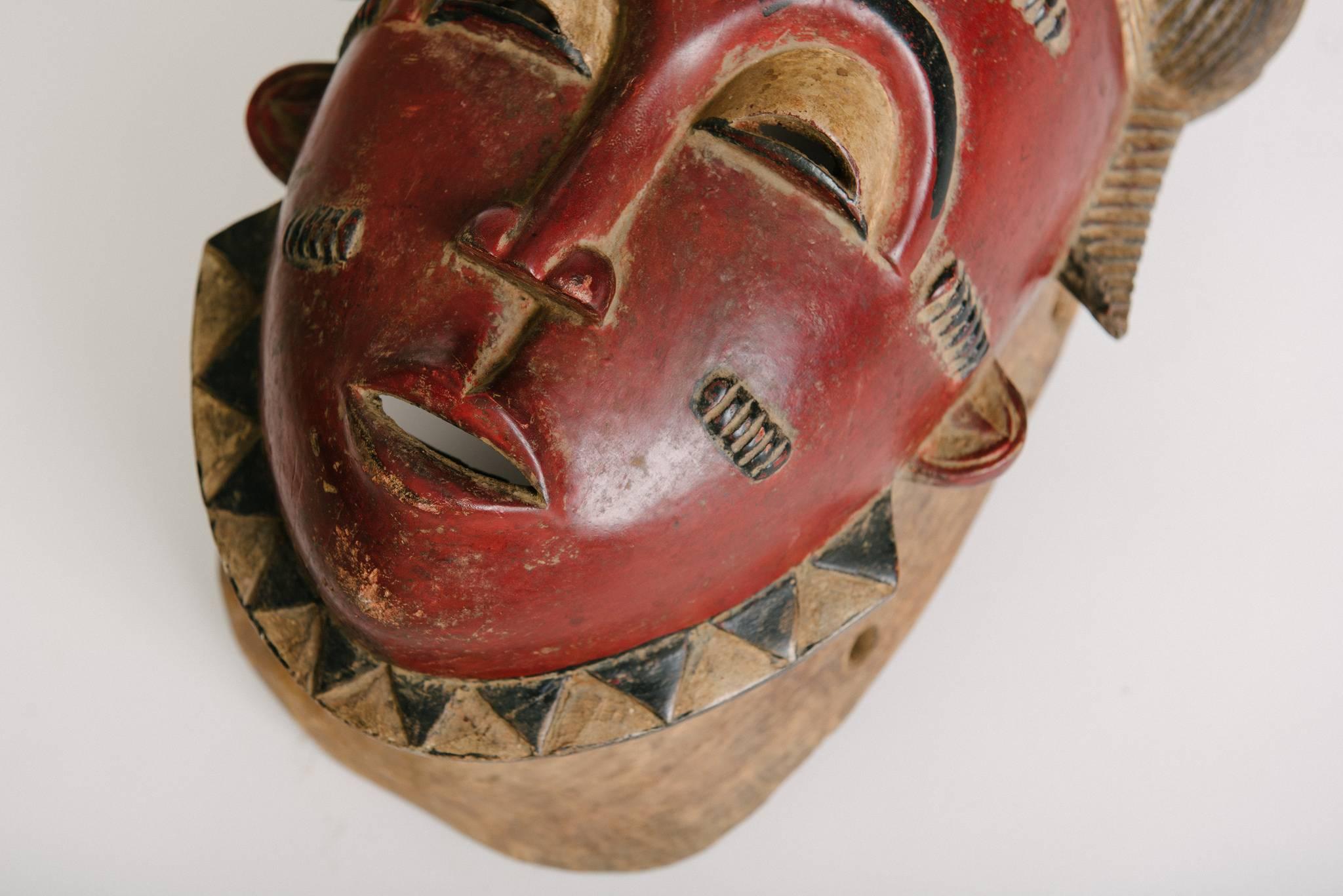 Carved Pair of 20th Century Gouro Male and Female Tribal Mask