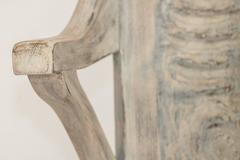 Early 20th Century Pair of Carved Oak Skeleton Face Chairs