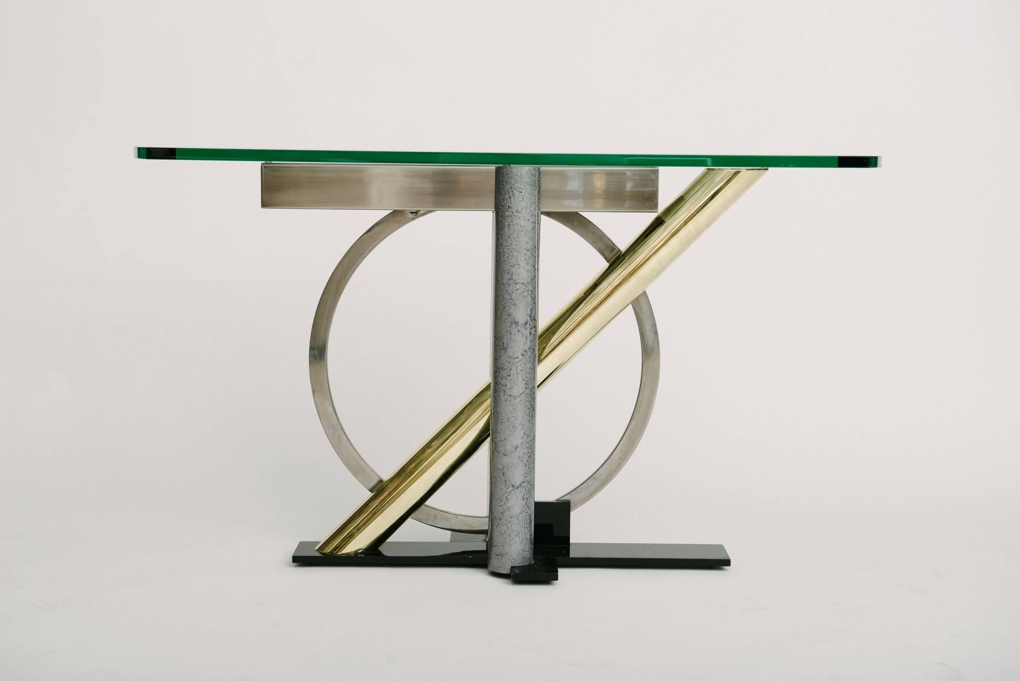 Vintage geometric mixed metal console table with glass top by Kaizo Oto for Design Institute America.