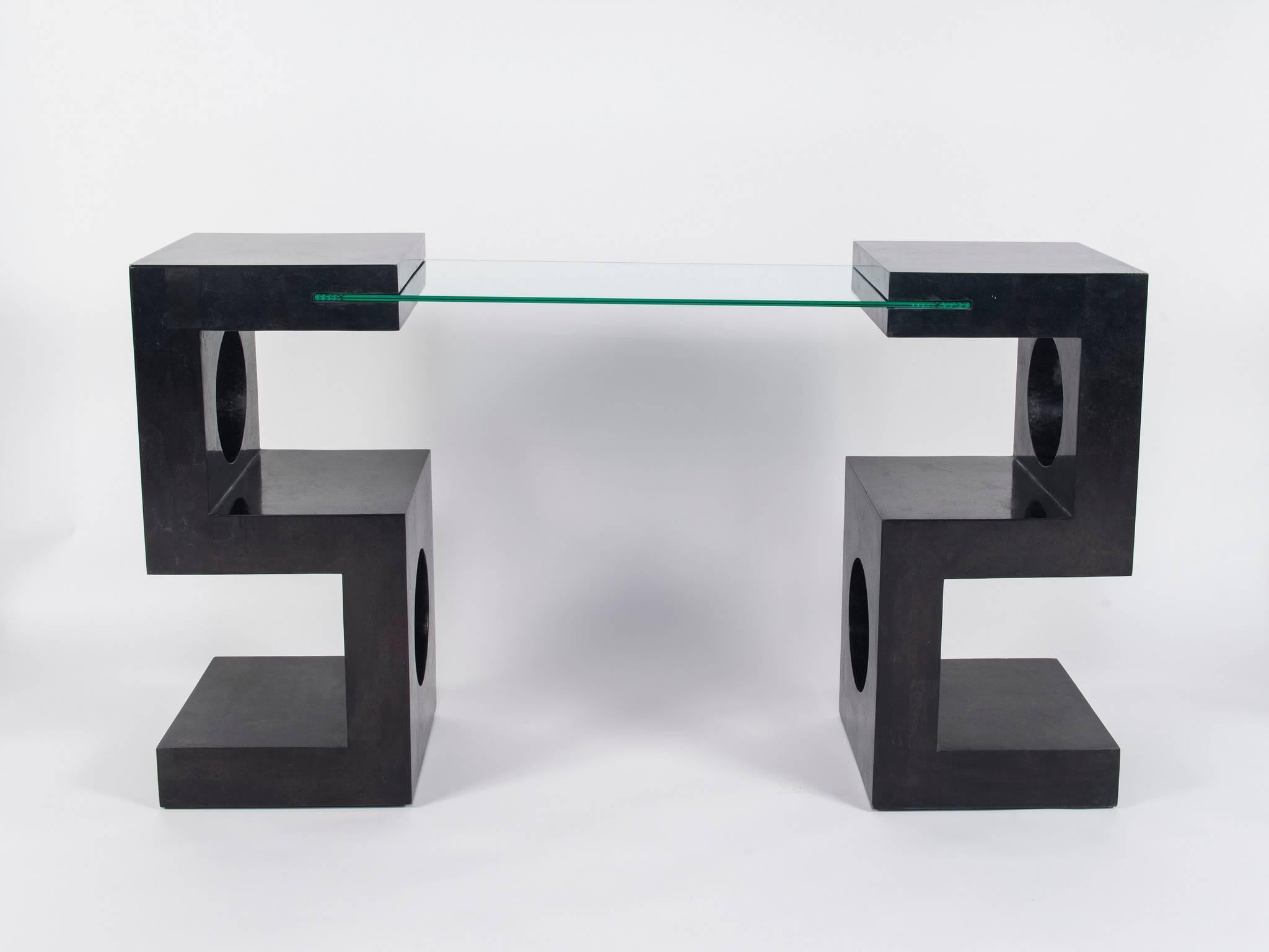 Mid-Century Modern tessellated black marble console table with glass top, circa 1970.