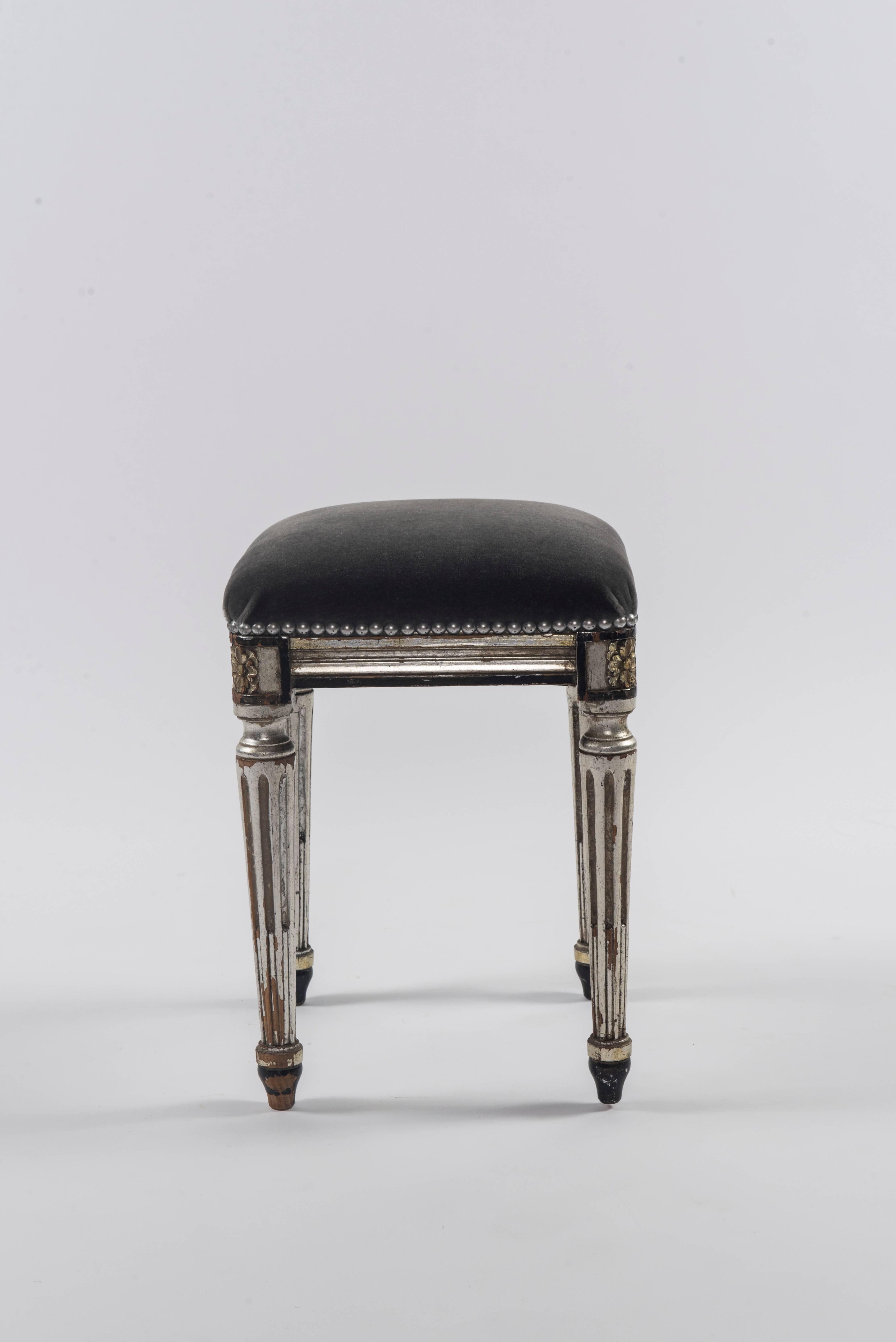 Pair of 1940s Louis XVI silver giltwood tabourets newly upholstered in a gray mohair. 

 