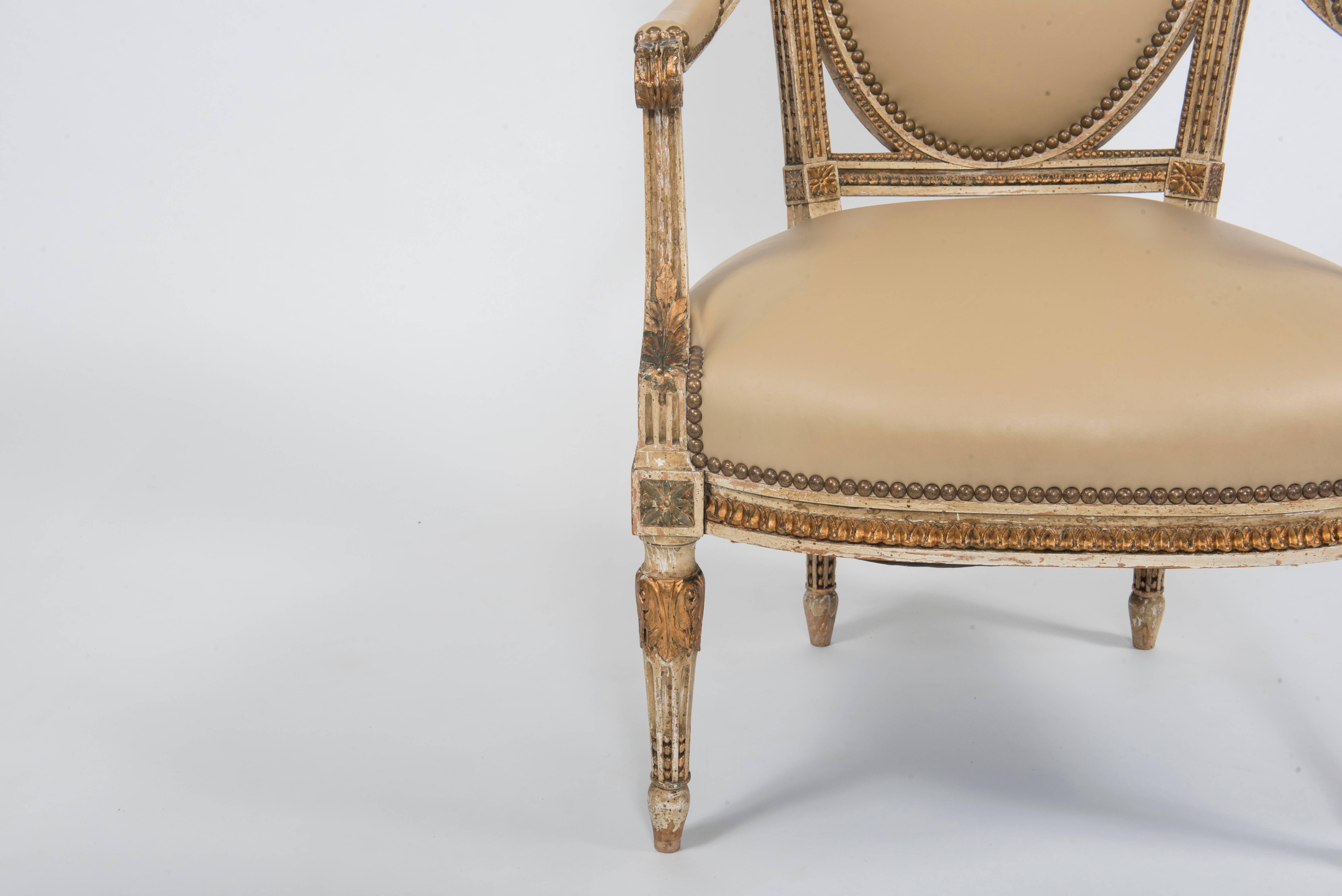 Leather Pair of Early 20th Century Painted and Gilt French Louis XVI Style Fauteuils