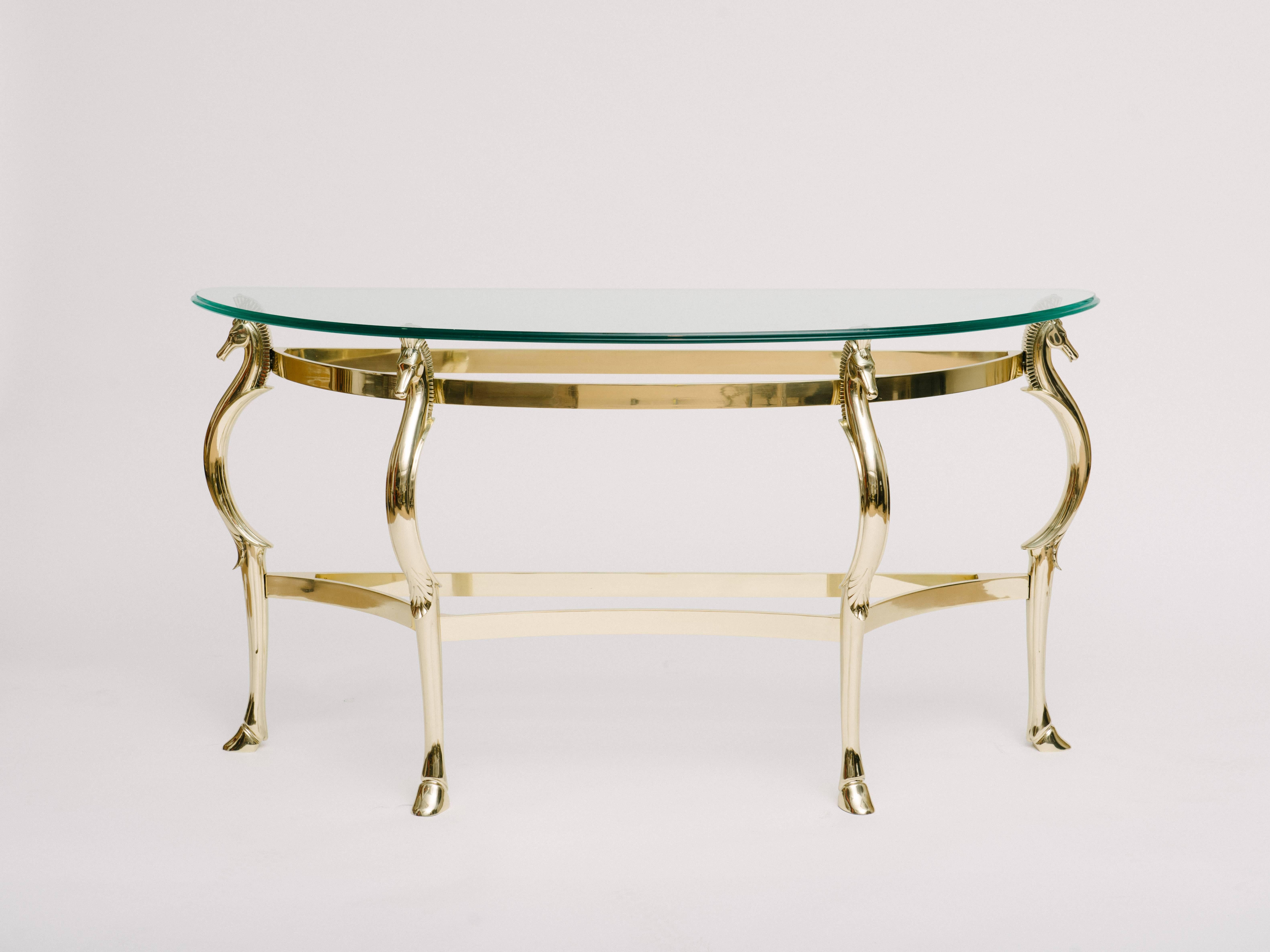 Italian polished brass console demilune console table with glass top.
