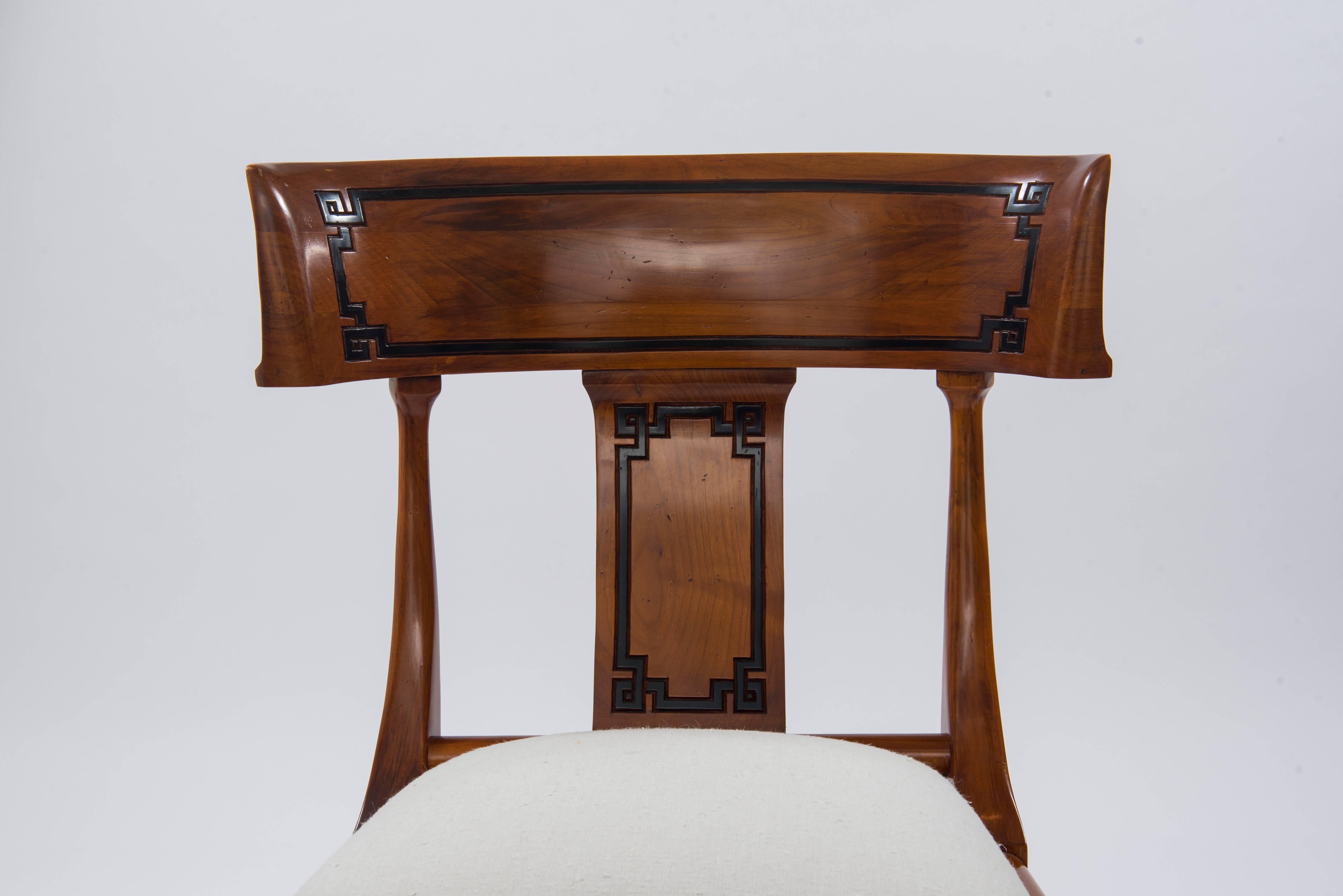 Carved Set of Four Empire Style Cherry Wood Klismos Chair