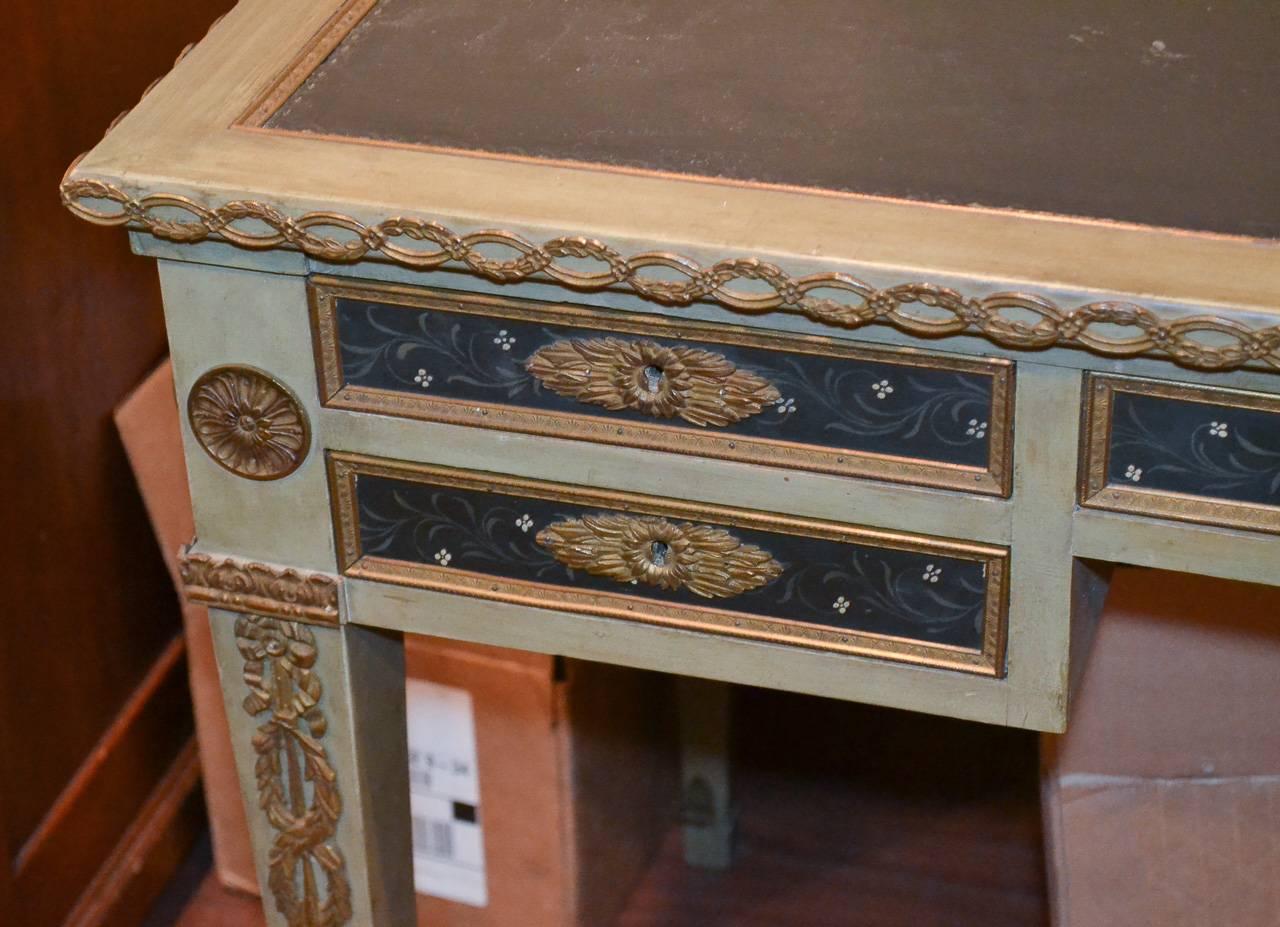 Wonderful 19th century French Napoleon III hand-painted five-drawer writing desk. Having bronze mounts, hardware, trim, and gallery. Featuring lovely painted drawers in foliate motif, and painted figure of classical lady on tooled leather top.