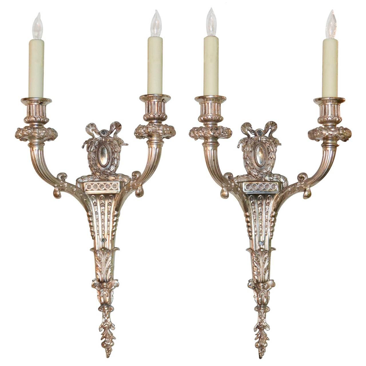 Good Pair of French Classical Silver over Bronze Two-Light Sconces For Sale