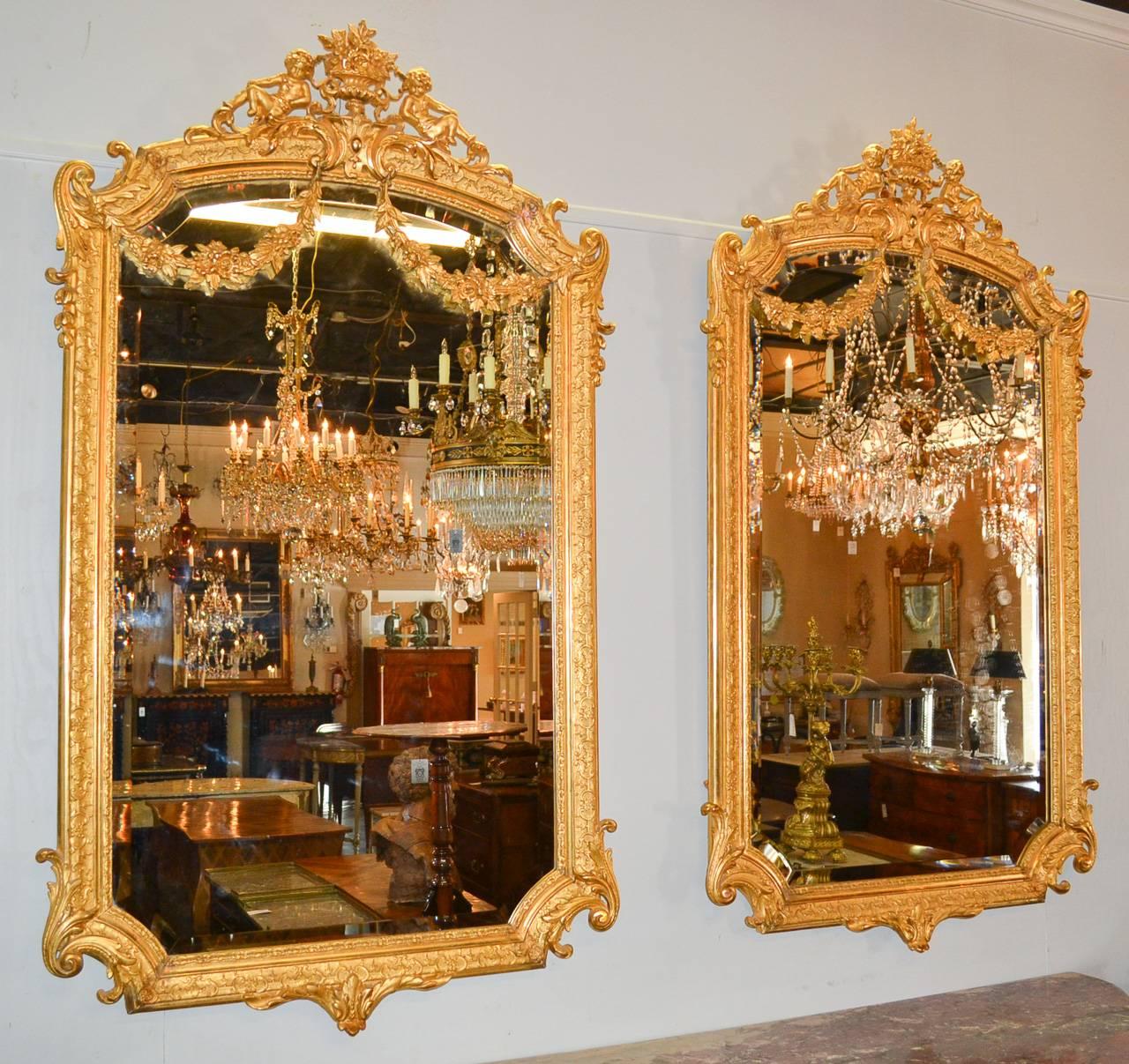 Early 20th Century Radiant Pair of French Louis XV Style Mirrors