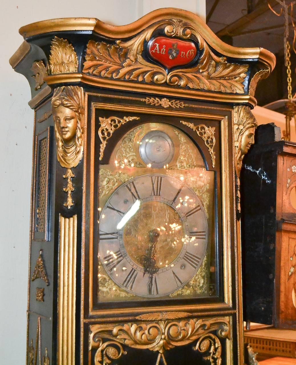 Stunning 19th century Continental black lacquered grandfather clock. Having detailed gilt bronze mounts, carved parcel-gilt accents, and gorgeous aged patina. Please view all pictures to enjoy, serious inquiries are welcome!
 