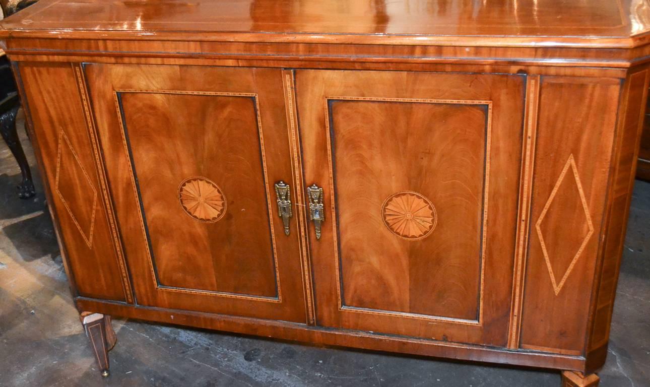 Exceptional English inlaid mahogany two-door server / bar. Having impeccable clean inlays overall, top that reveals shelves and basin, and a gorgeous finish and patina. Wonderful for numerous designs!