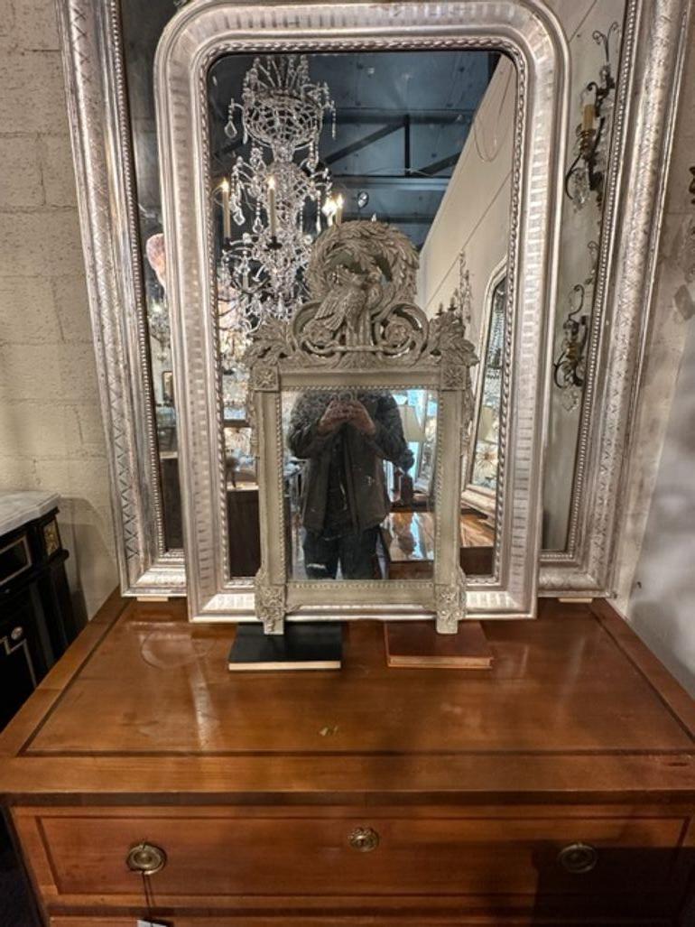 Beautiful 19th century French Louis XVI style carved and painted petite mirror. Featuring an elaborate crest at the top including 2 birds. Sure to impress!! So pretty!