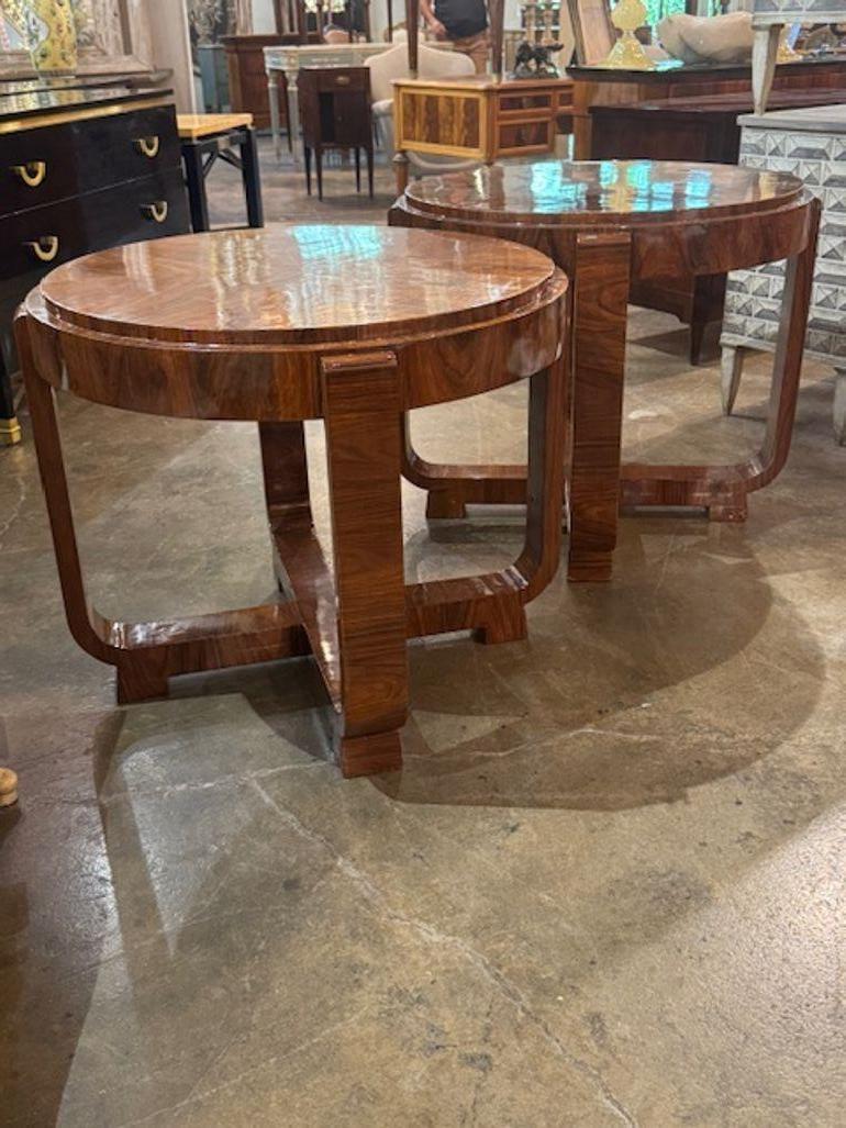 Pair of Italian Art Deco walnut side tables. Italian Art Deco walnut side tables are a perfect blend of rich materials and streamlined 20th-century design. These tables are versatile enough to complement both vintage and contemporary interiors. 33W