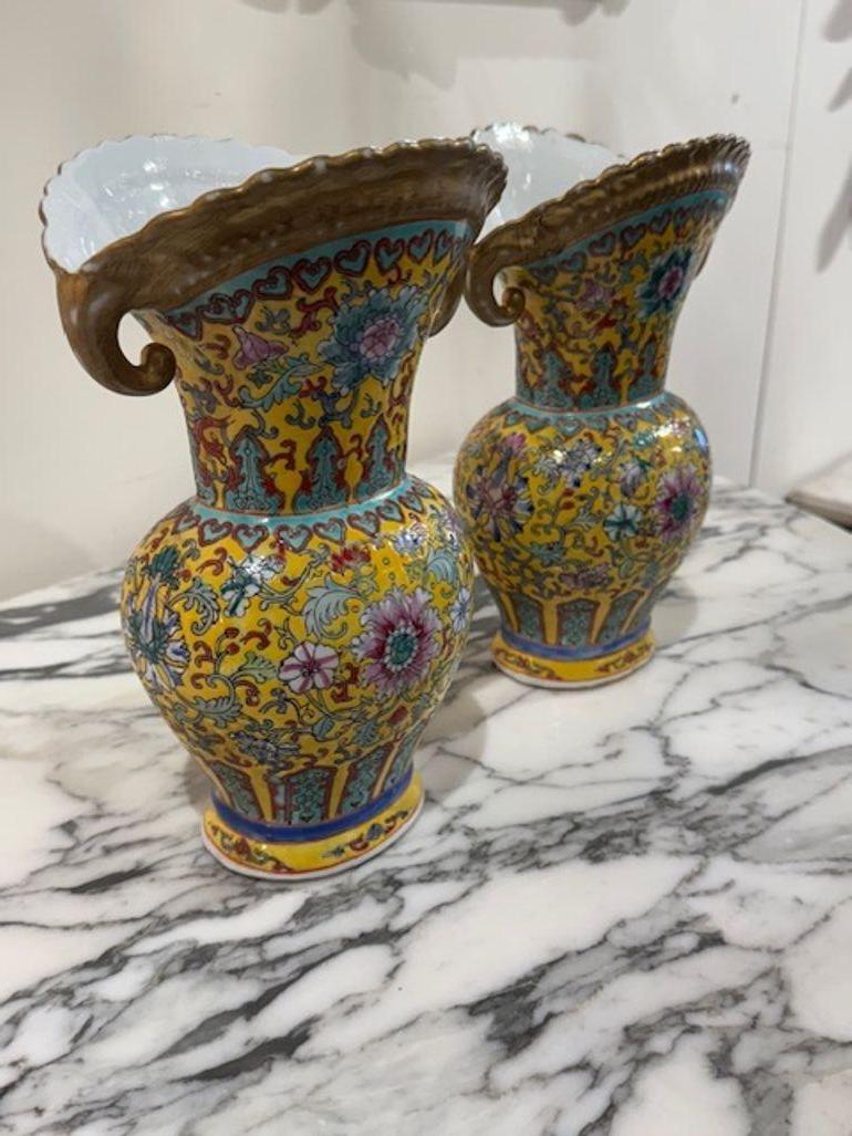 Rare pair of 19th century Japanese shaped cloisonné' yellow vases. If you're eyeing a pair of Japanese cloisonné vases, you're stepping into a world of exquisite craftsmanship and vibrant artistry. These vases, often from the Meiji period