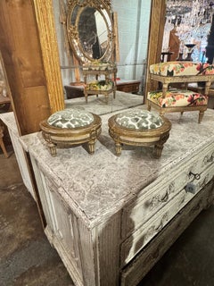 Pair of French Louis XVI Giltwood Ottomans