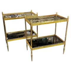 Par de mesitas de Jansen Manner de latón y cristal negro