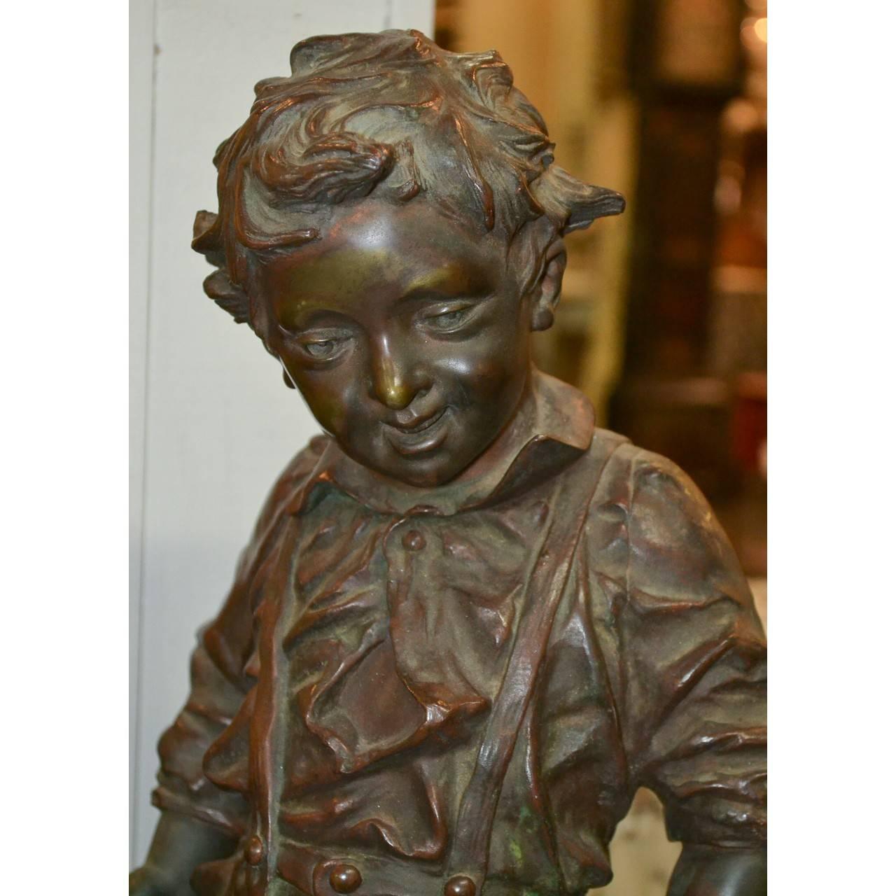 Bronze statue of a boy by French sculptor Charles Anfrie.
Charles was born in 1833 and died in 1905,
circa 1870
Measures: 24