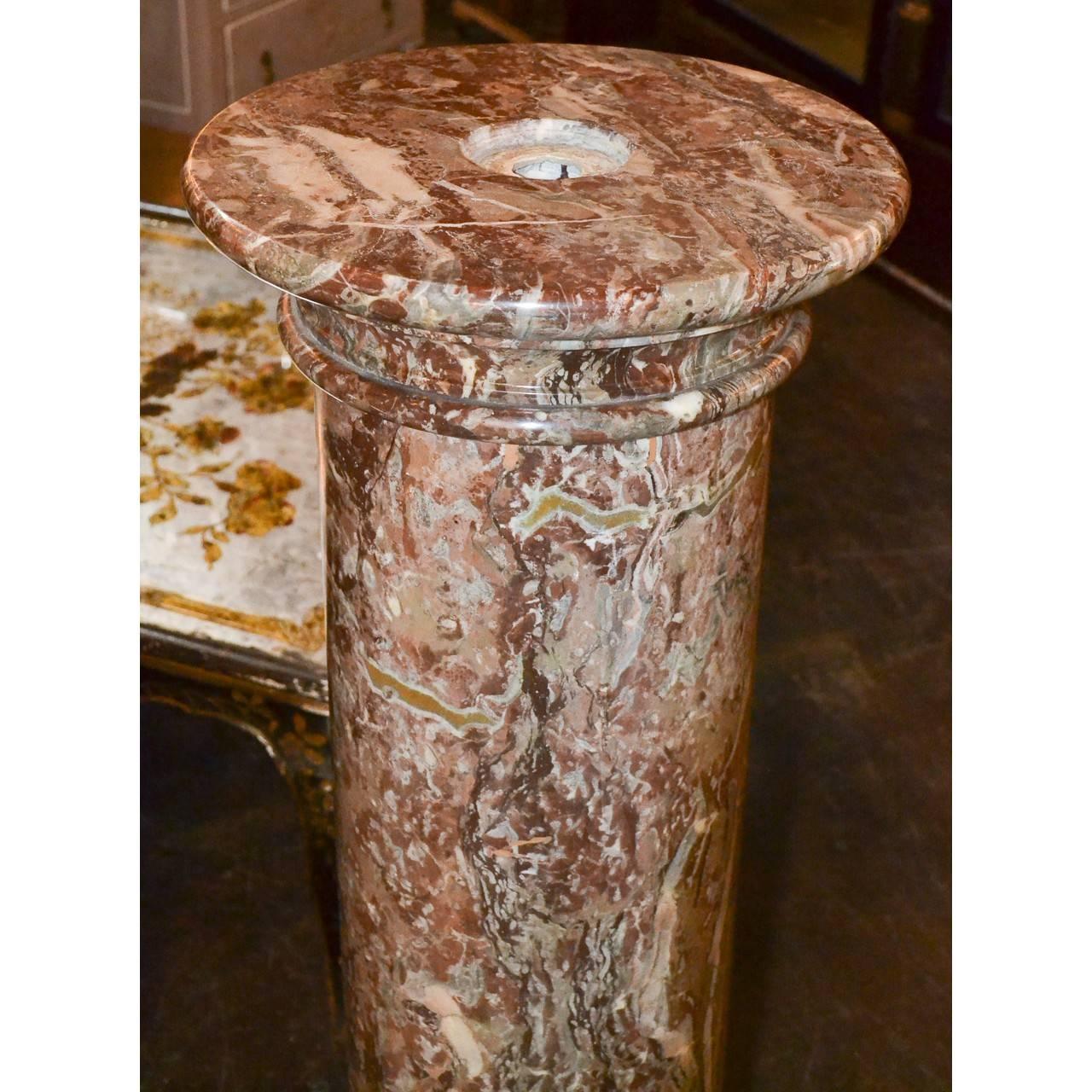 Substantial 19th century marble pedestal from France.

Measure: 40 inches height x 17 inches wide
top 14.5 inches.