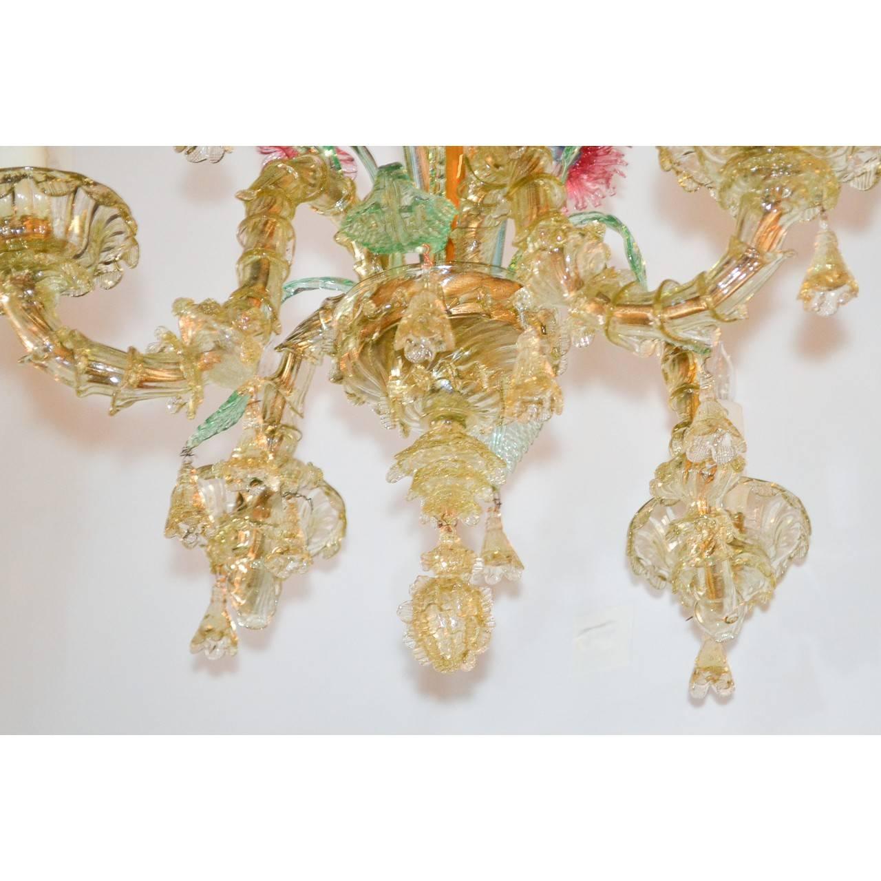 Exquisite four-light antique Murano chandelier handmade in Italy.
A multi colored jewel! Ready to install,
circa 1920.

Measure: 23 inches height x 24 inches wide.