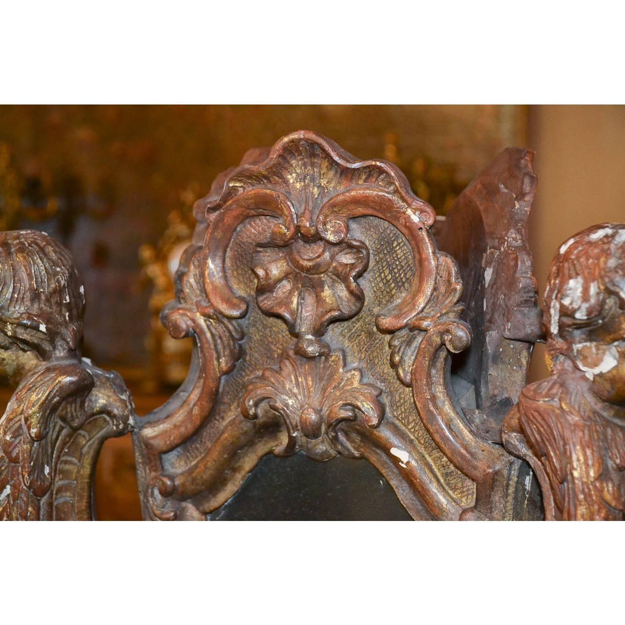 Beautifully aged hand-carved 18th century Italian wooden centerpiece with three mirrored sides.