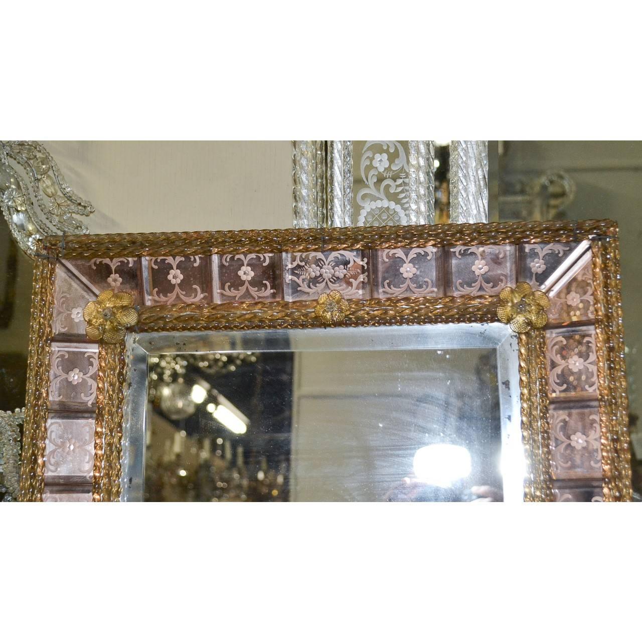 Gorgeous pink handmade Italian Venetian etched mirror.
The bottom pegs can be easily removed,
circa 1920.