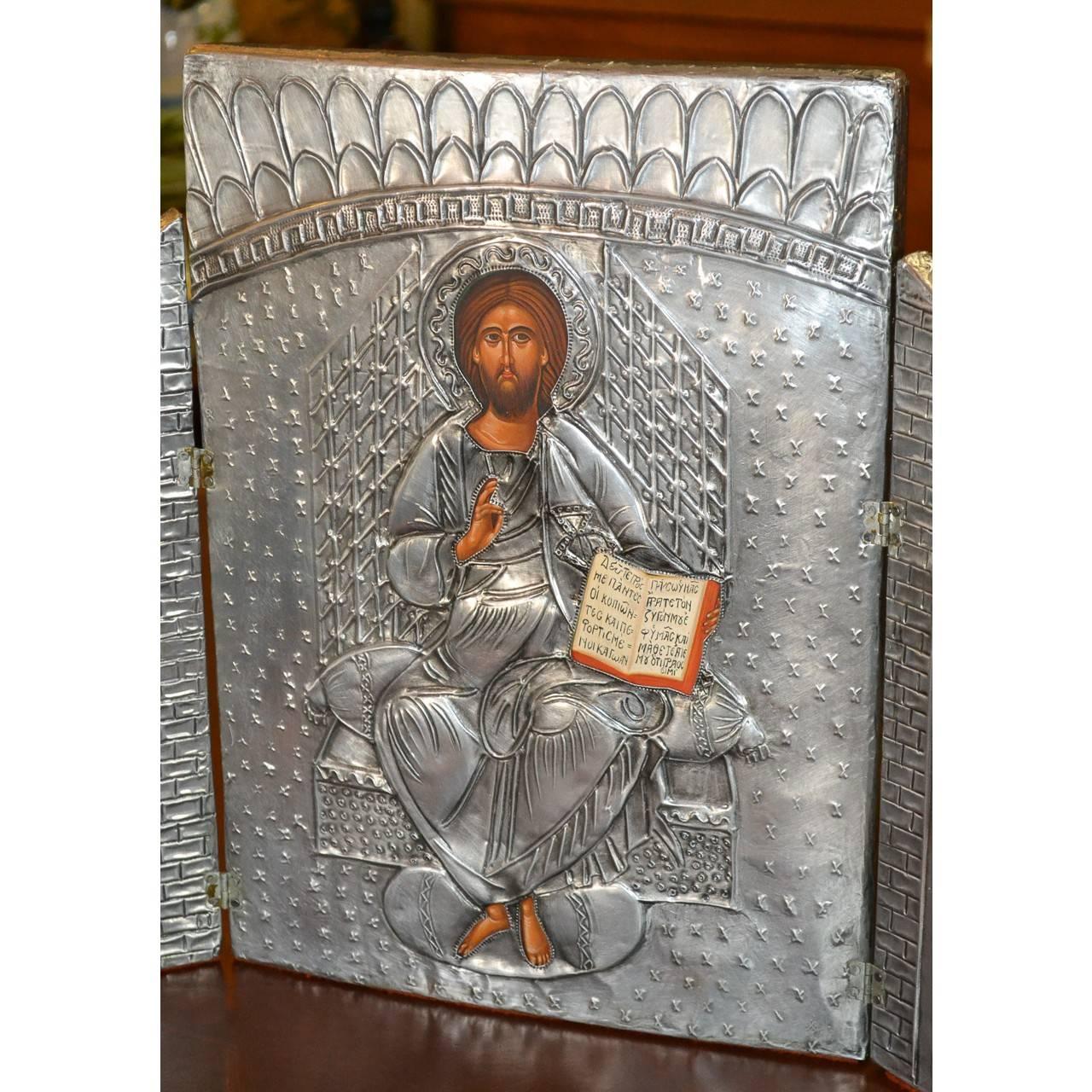 This icon was meticulously handmade using traditional techniques from the 15th century by P. Pappas of Dallas, Texas in the 1970s.
The back of the triptych is signed ALMIGHTY P. PAPPAS 15TH C
All silver work is handmade and the painted parts
