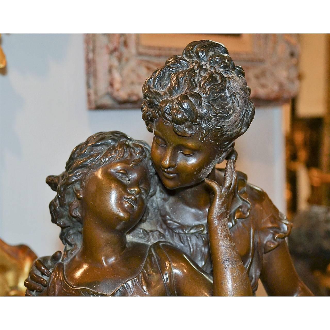 (Auguste) Moreau, 1855-1919. Noteworthy 19th century French bronze grouping of two sisters, elegantly depicted in flowing garb and superbly detailed with a rich gold brown patina. 

Signed on the base Moreau; circa 1880. 

Measures: Height, 22