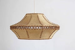 Mid-century pendant light made of parchment and leather straps 1960s