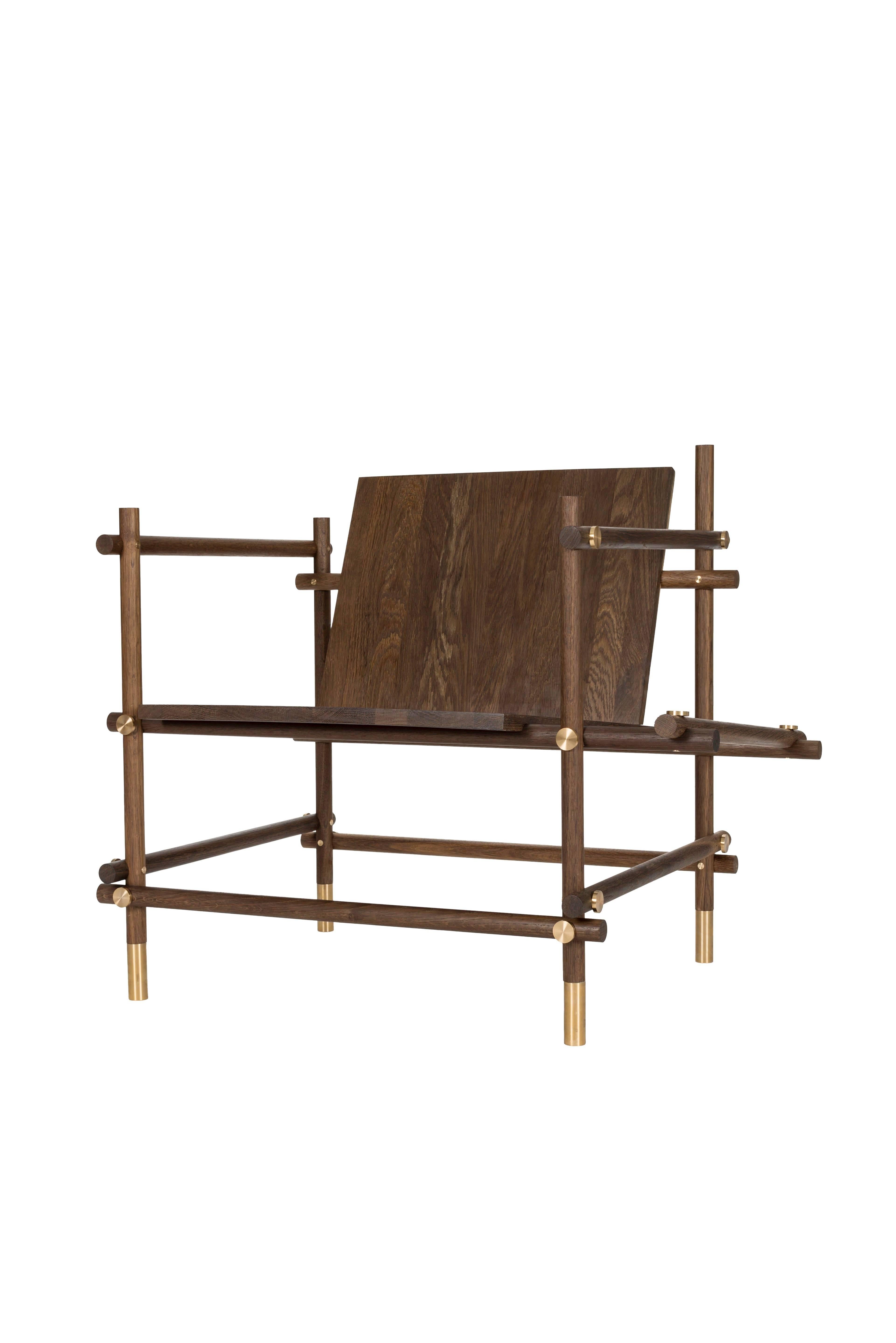 “Useful Chair” suggests scaffolding, a comment on the temporary, transitory nature of being an artist in a foreign country, somewhat displaced and overlooked, yet a necessary element in building sites, while the physical design of the chair focuses