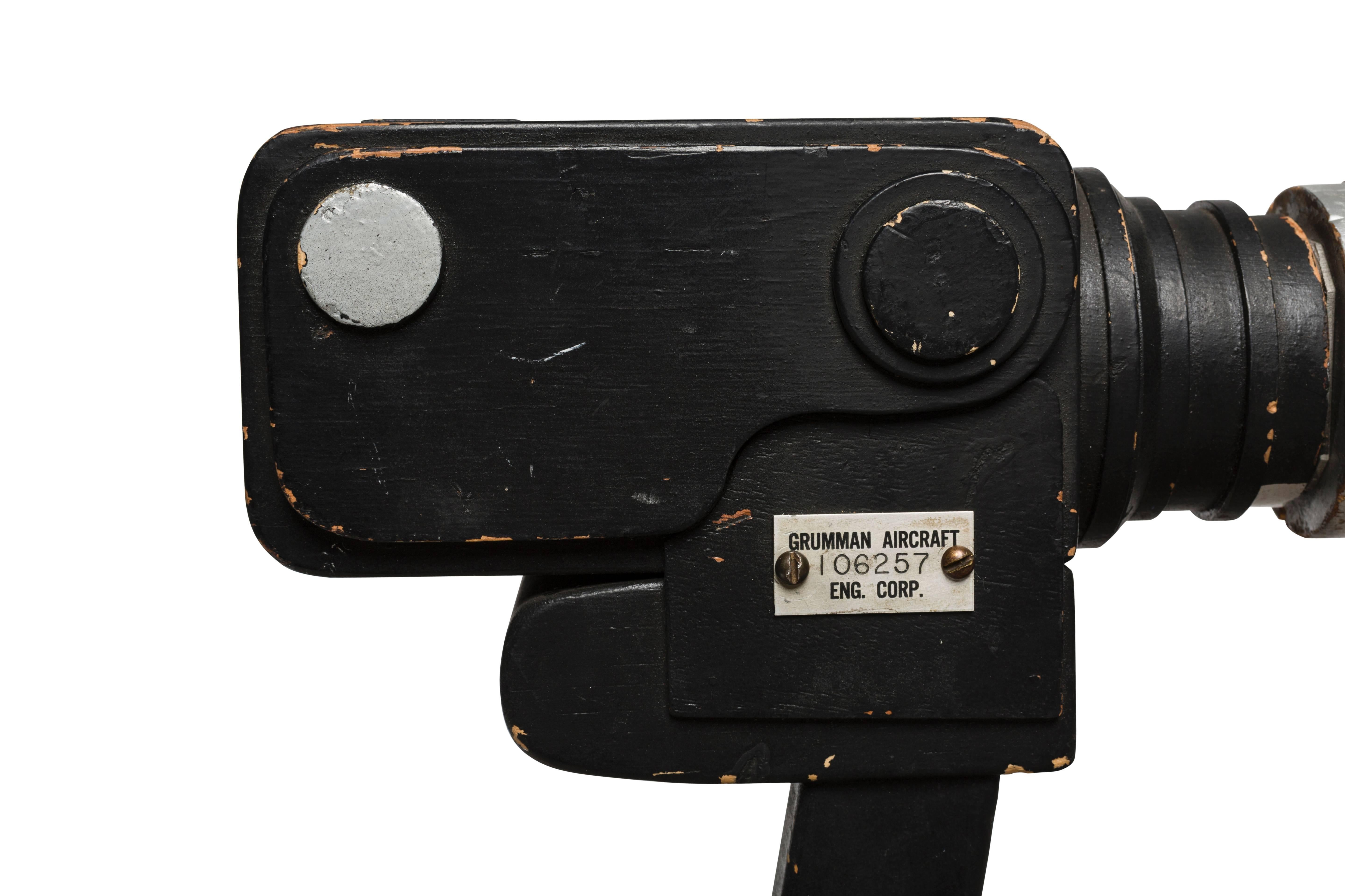 This wooden mock-up of the storied Hasselblad 500 camera with telescopic lens was produced by the Grumman Aircraft Engineering Corporation as a practice tool or prototype for the real camera. The actual Hasselblad 500, on which this mock-up is