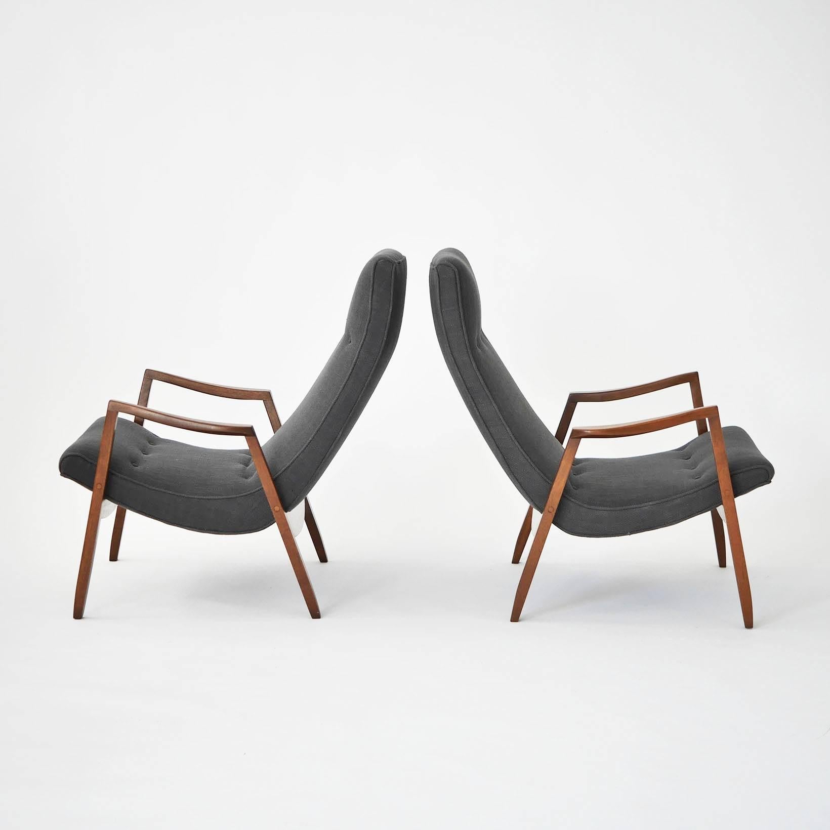 Early pair of Milo Baughman scoop lounge chairs. Walnut frames and slate grey upholstery. Newly restored pair.