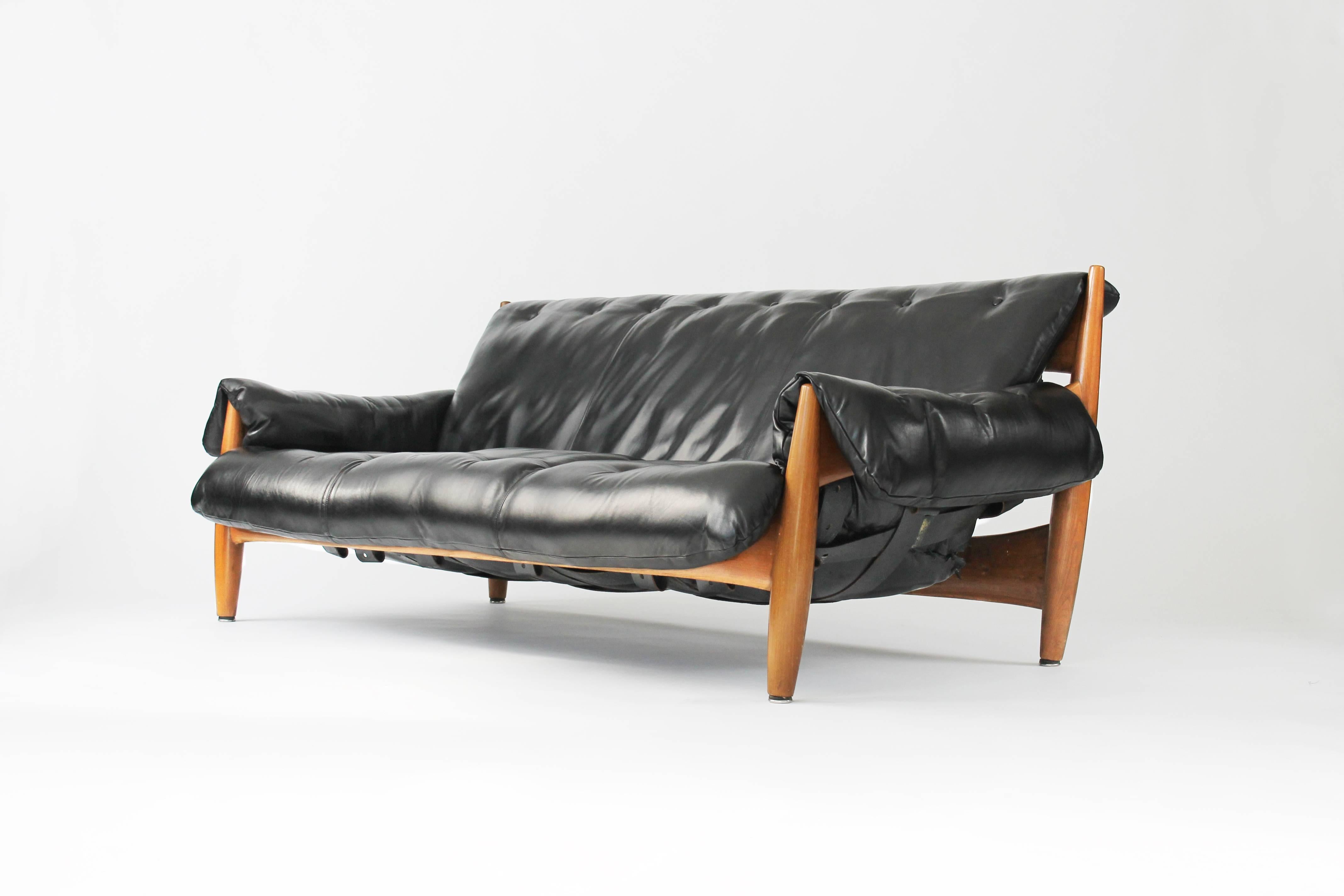 Sheriff sofa designed by Sergio Rodrigues and produced by ISA of Italy, circa 1960. Jacaranda and leather.