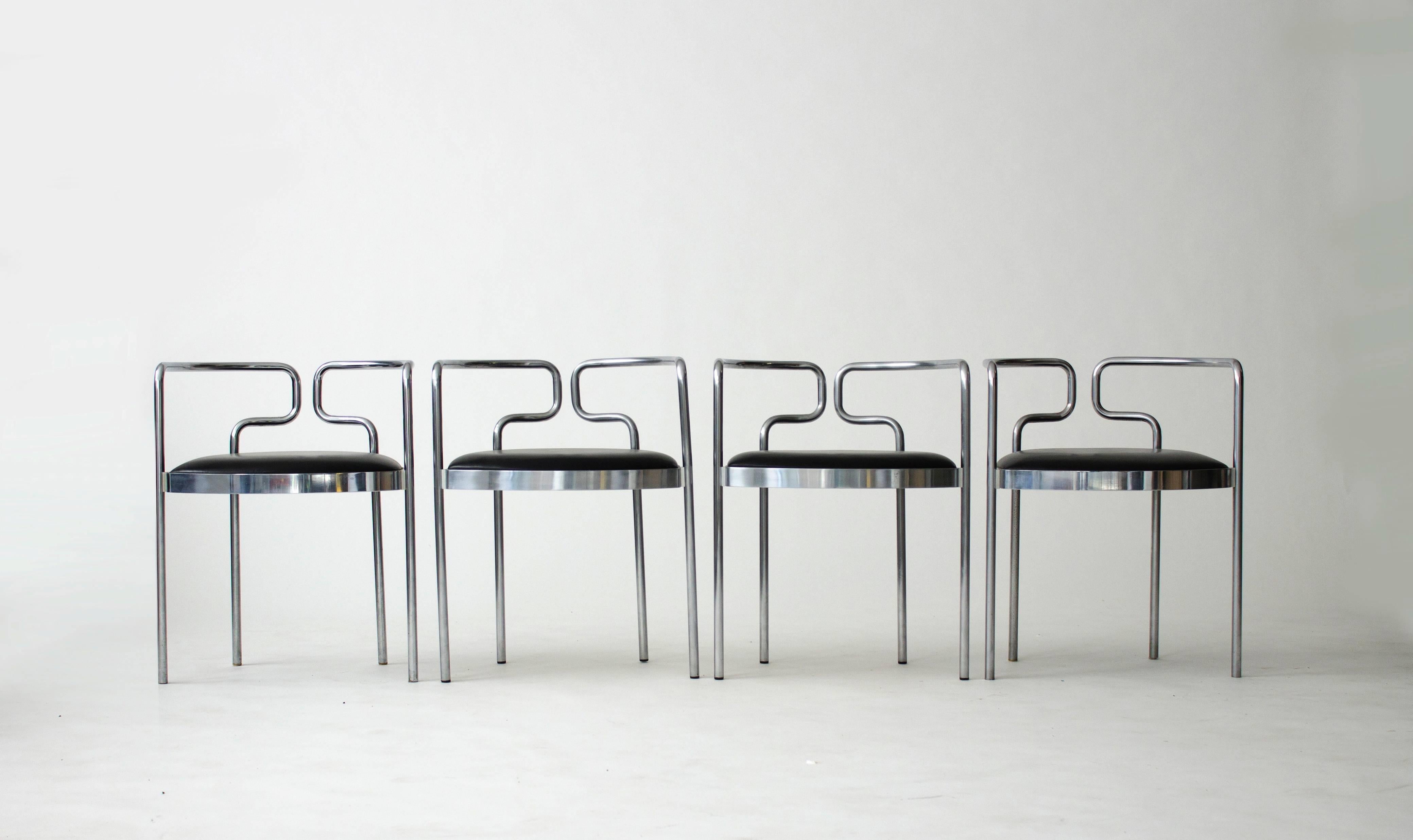 Set of four model #9230 chairs originally designed by Henning Larsen for the Kar Cafe in Copenhagen in 1967. This set of chairs was produced by Fritz Hansen in 1986 as part of a latter production run. In chromium-plated steel tubing with leather