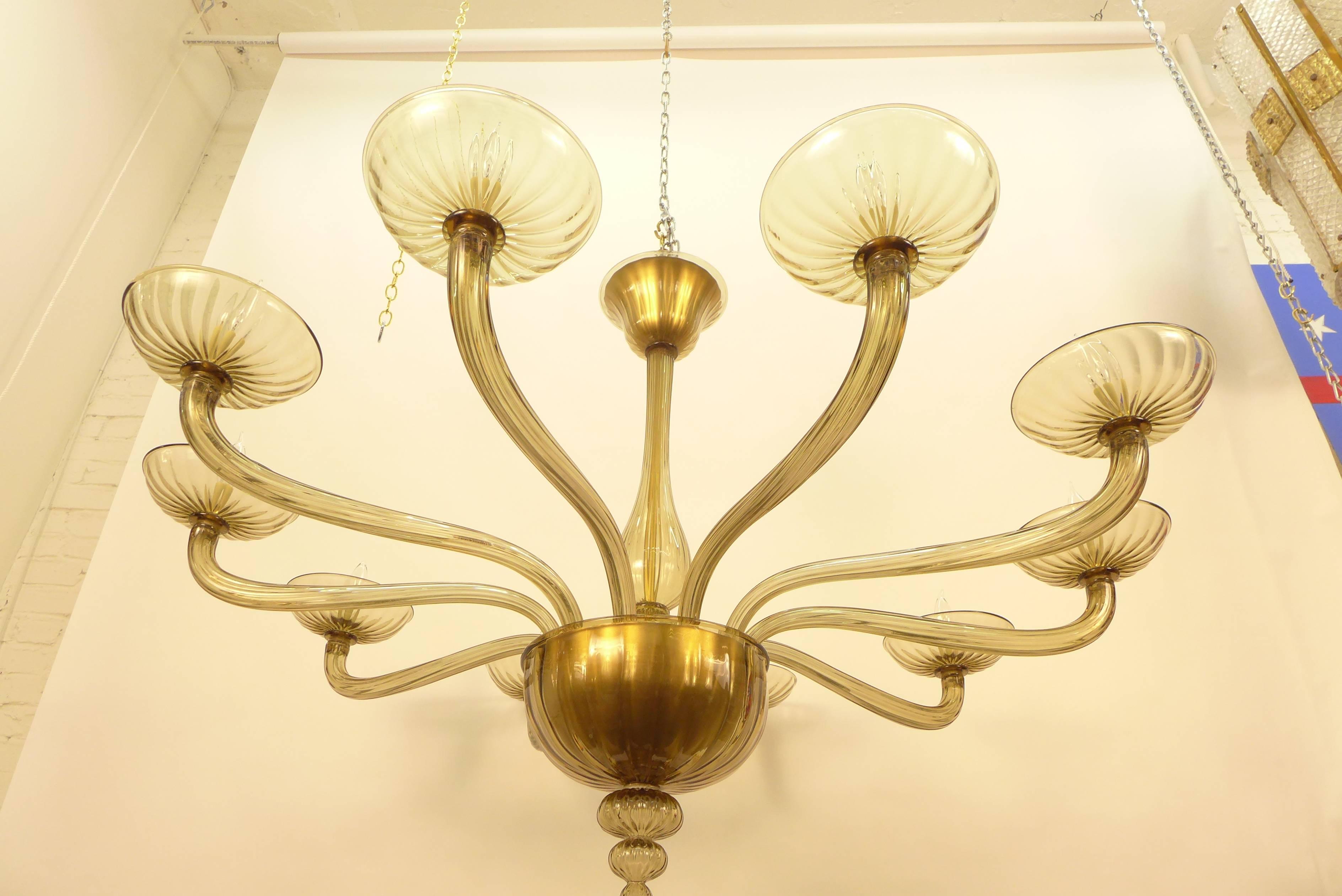 A very large and elegant Italian chandelier.
Beautiful cognac glass color and newly rewired.