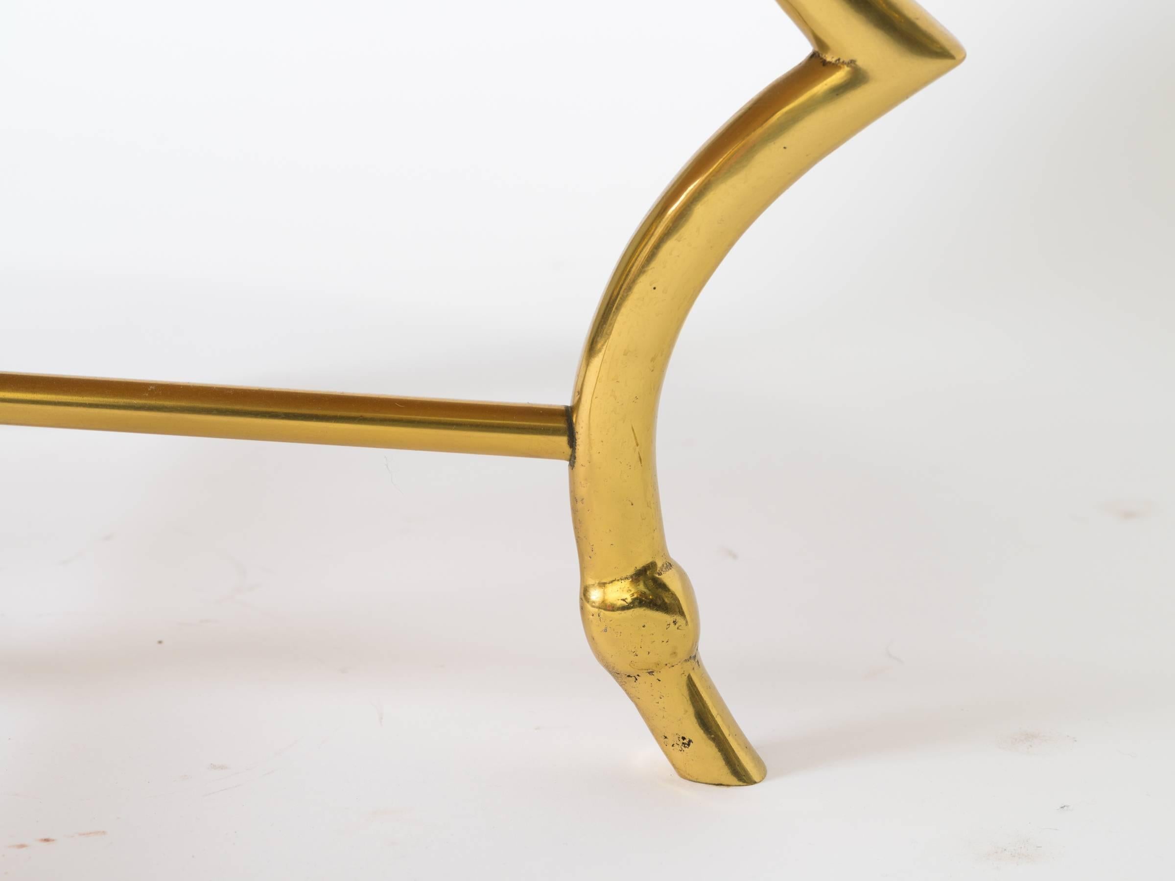 Brass ram hoof table with capiz top.