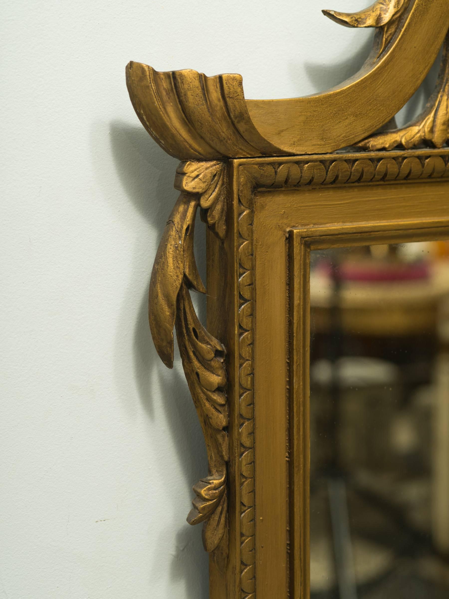 Italian wood medallion mirror.