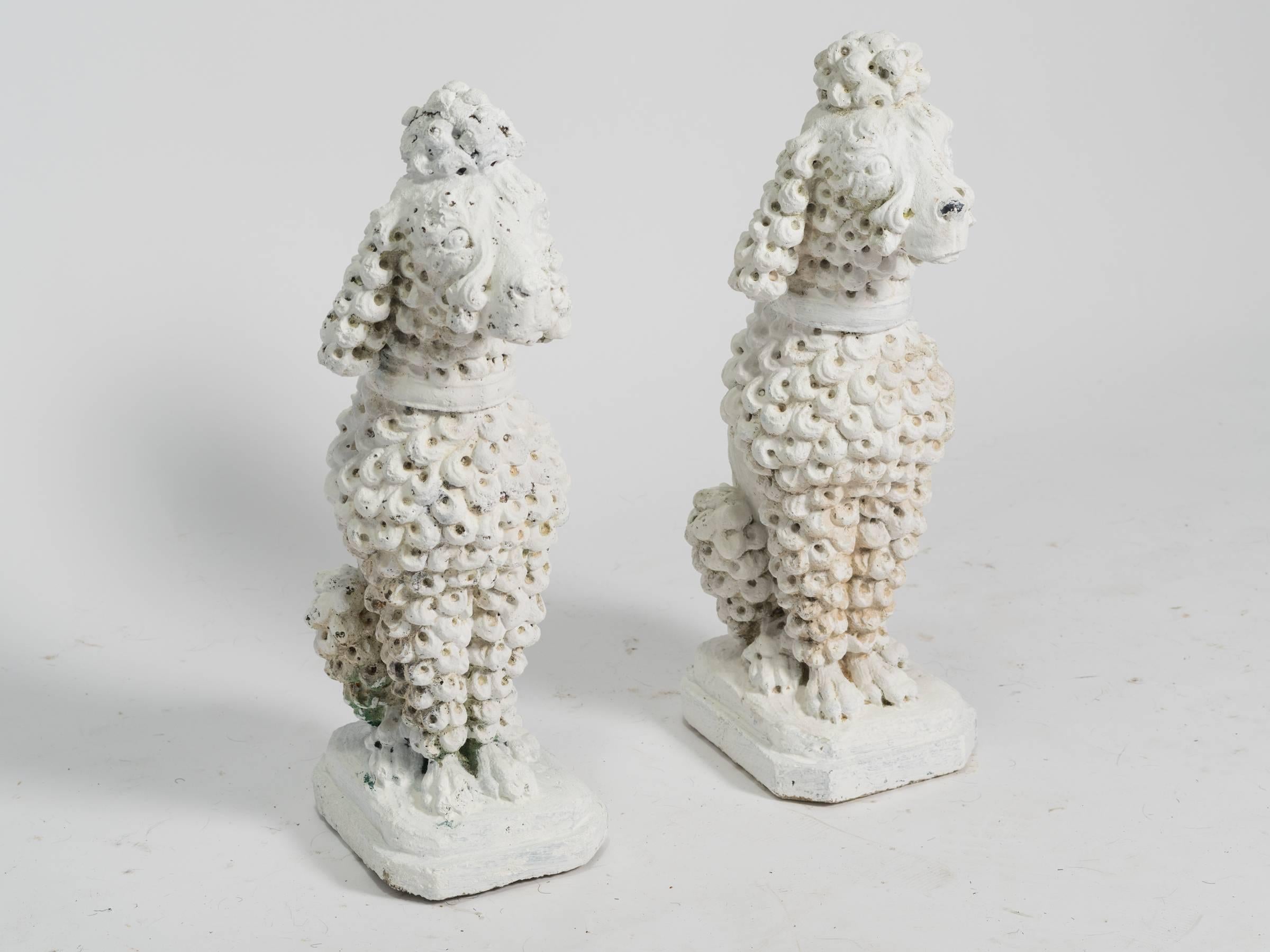 concrete poodle dog statues