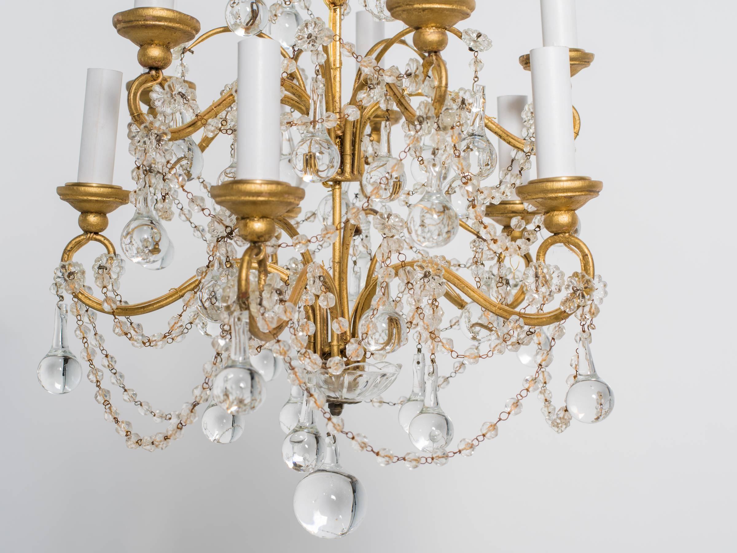 Italian 1960s chandelier dripping in crystal balls.