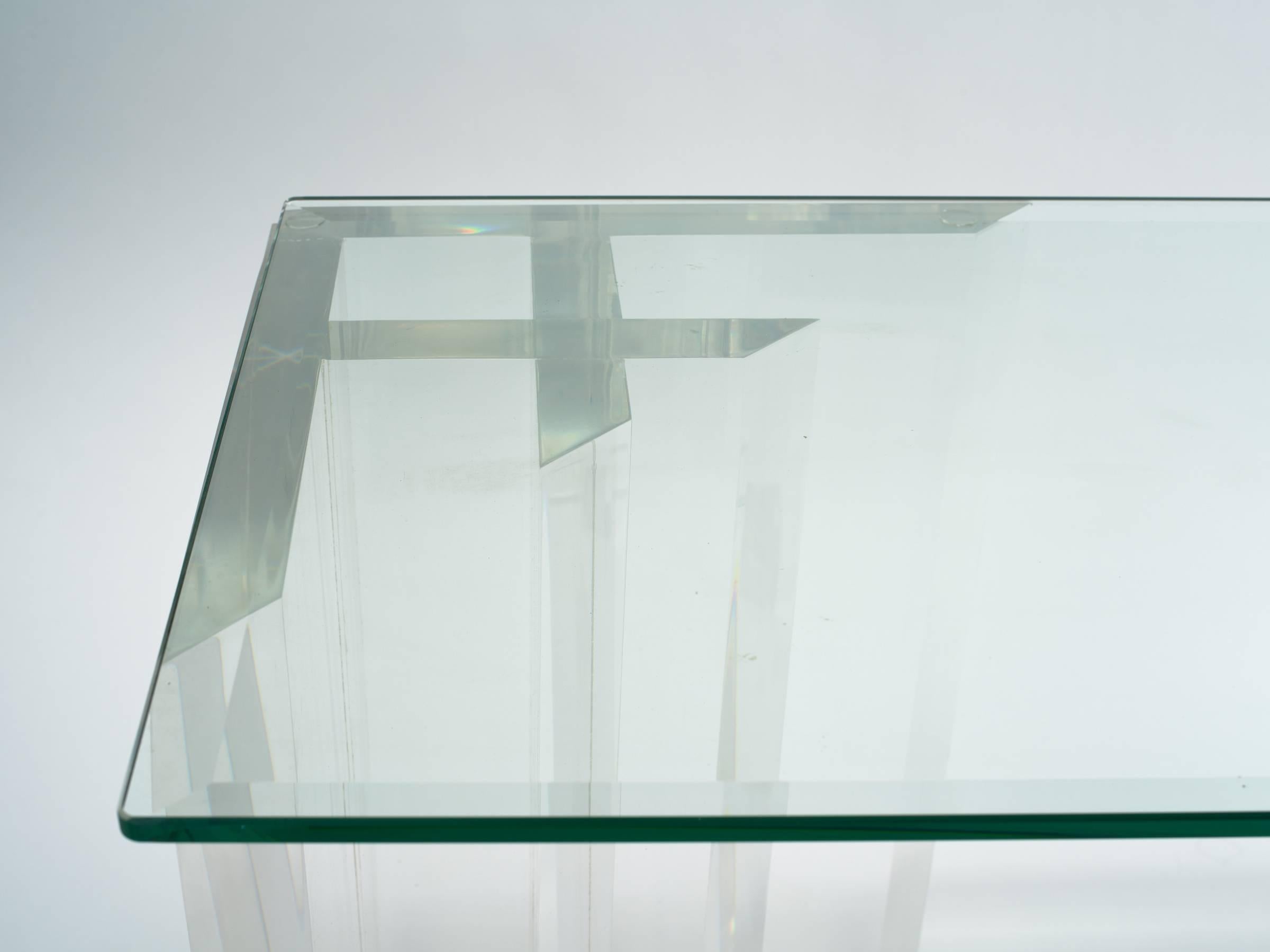 1970s very heavy thick Lucite bases, no glass. The glass shown is not included in the piece. It is merely to show how the console will look once a piece of glass is placed.

The console can be as long as you wish depending on the length of your